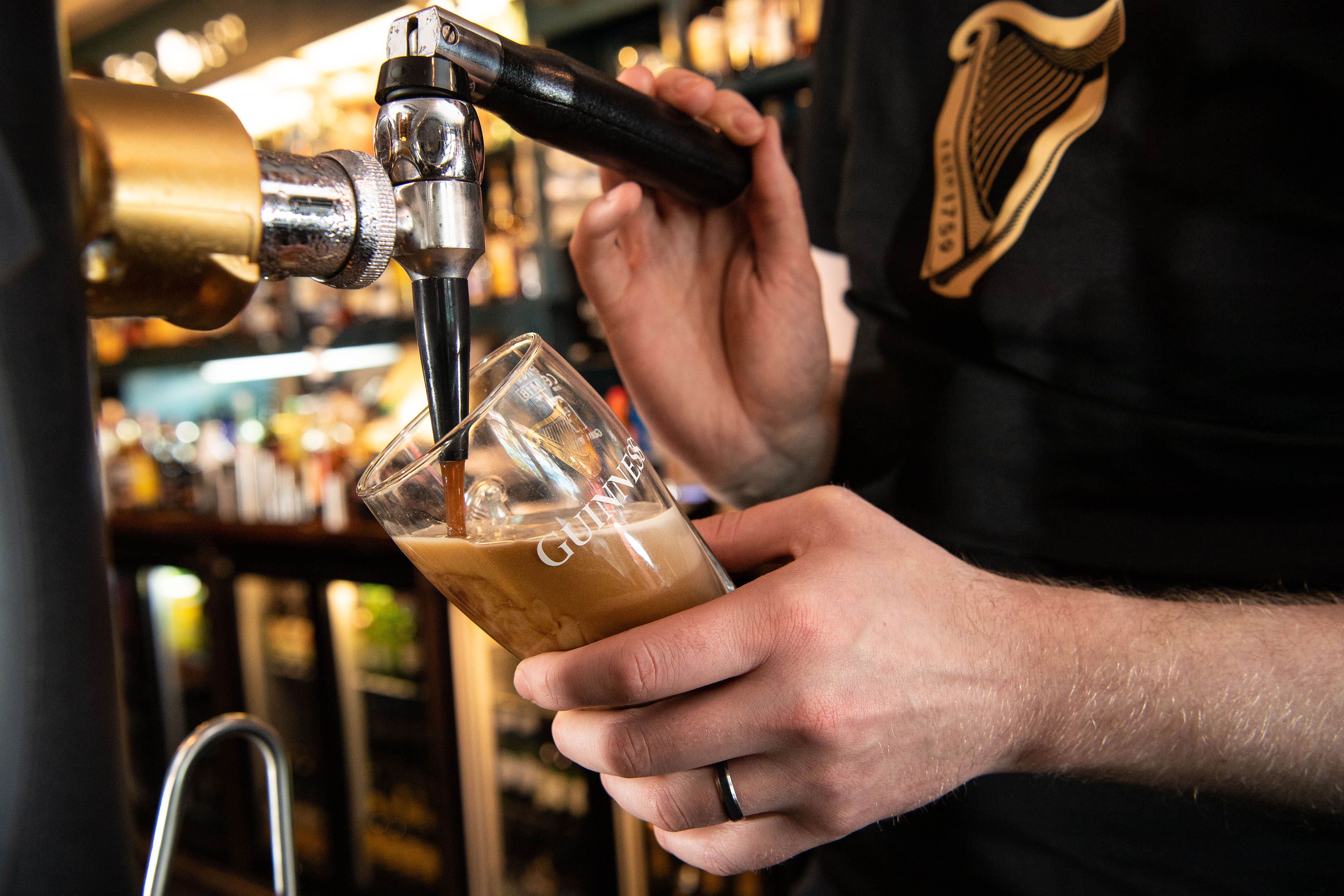 Draught beer drinkers are set to save 1p a pint from February next year (Jeff Spicer/PA)