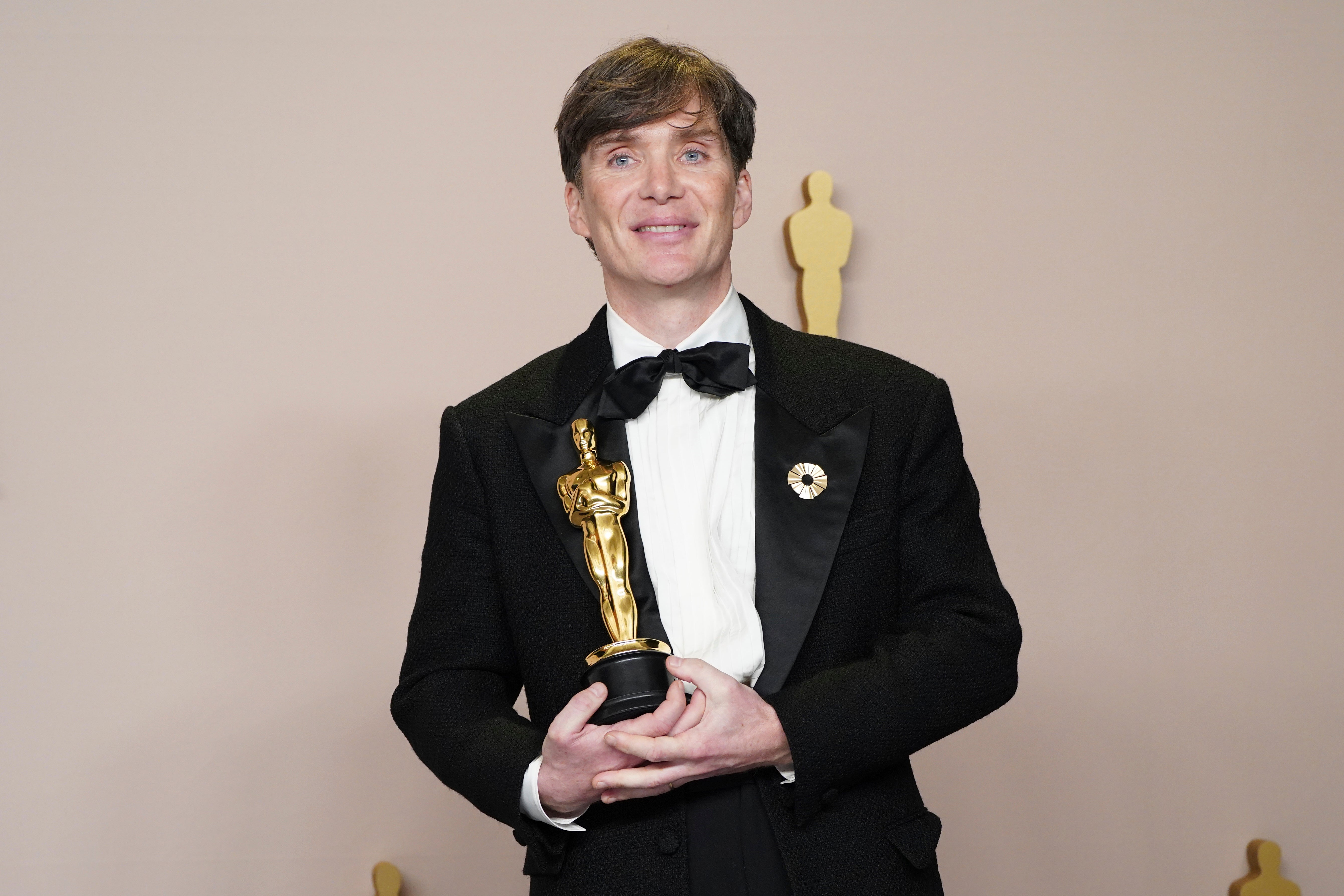 Cillian Murphy posing with his Best Actor Oscar for ‘Oppenheimer’ in 2024