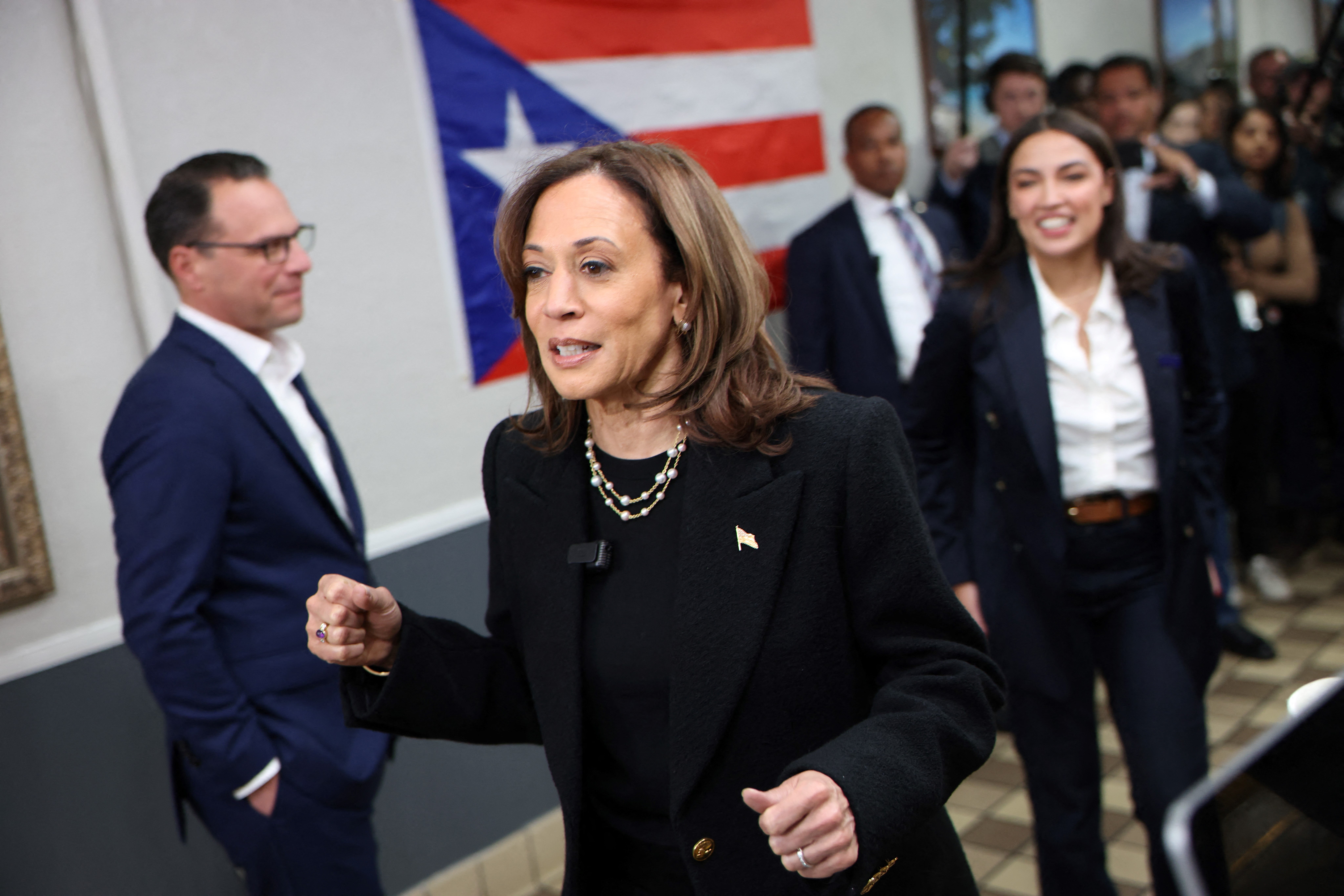 Vice President and Democratic presidential candidate Kamala Harris makes a stop at Old San Juan Cafe with Pennsylvania Governor Josh Shapiro and Representative Alexandria Ocasio Cortez, Democrat of New York