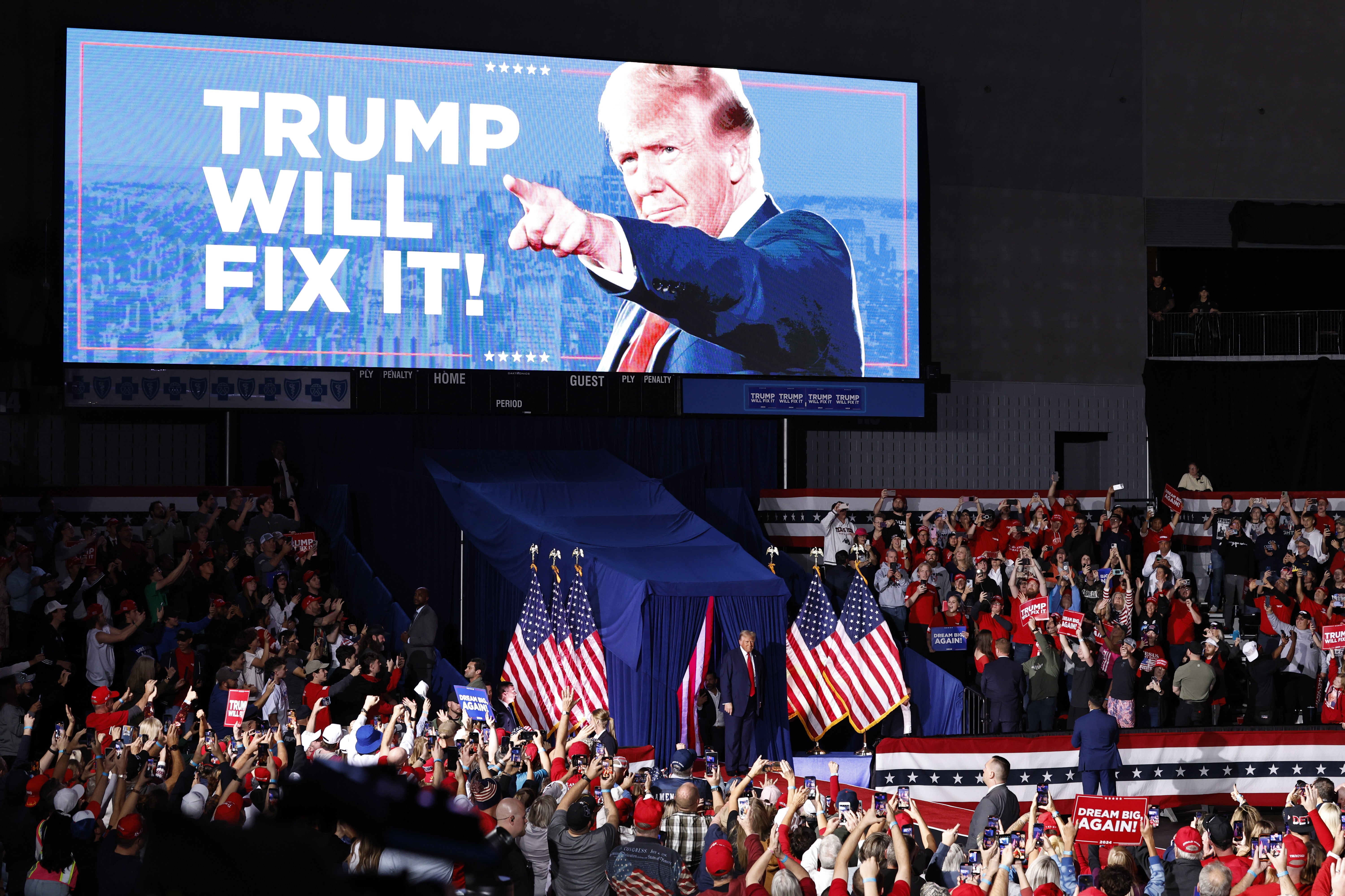 Republican presidential candidate and former US President Donald Trump arrives at a campaign rally in Grand Rapids, Michigan