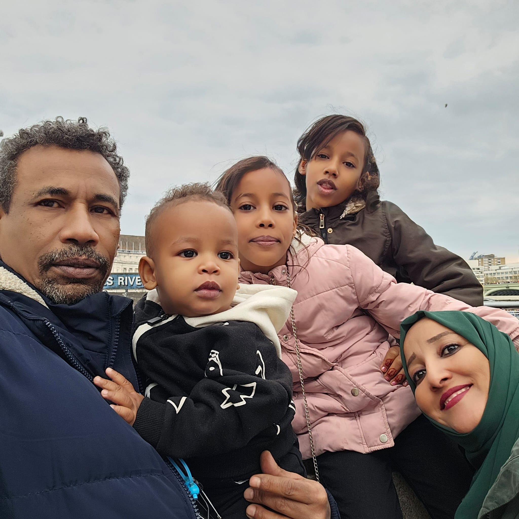 Roshdi Basheer Ali and Rania Issa pictured with their three youngest children