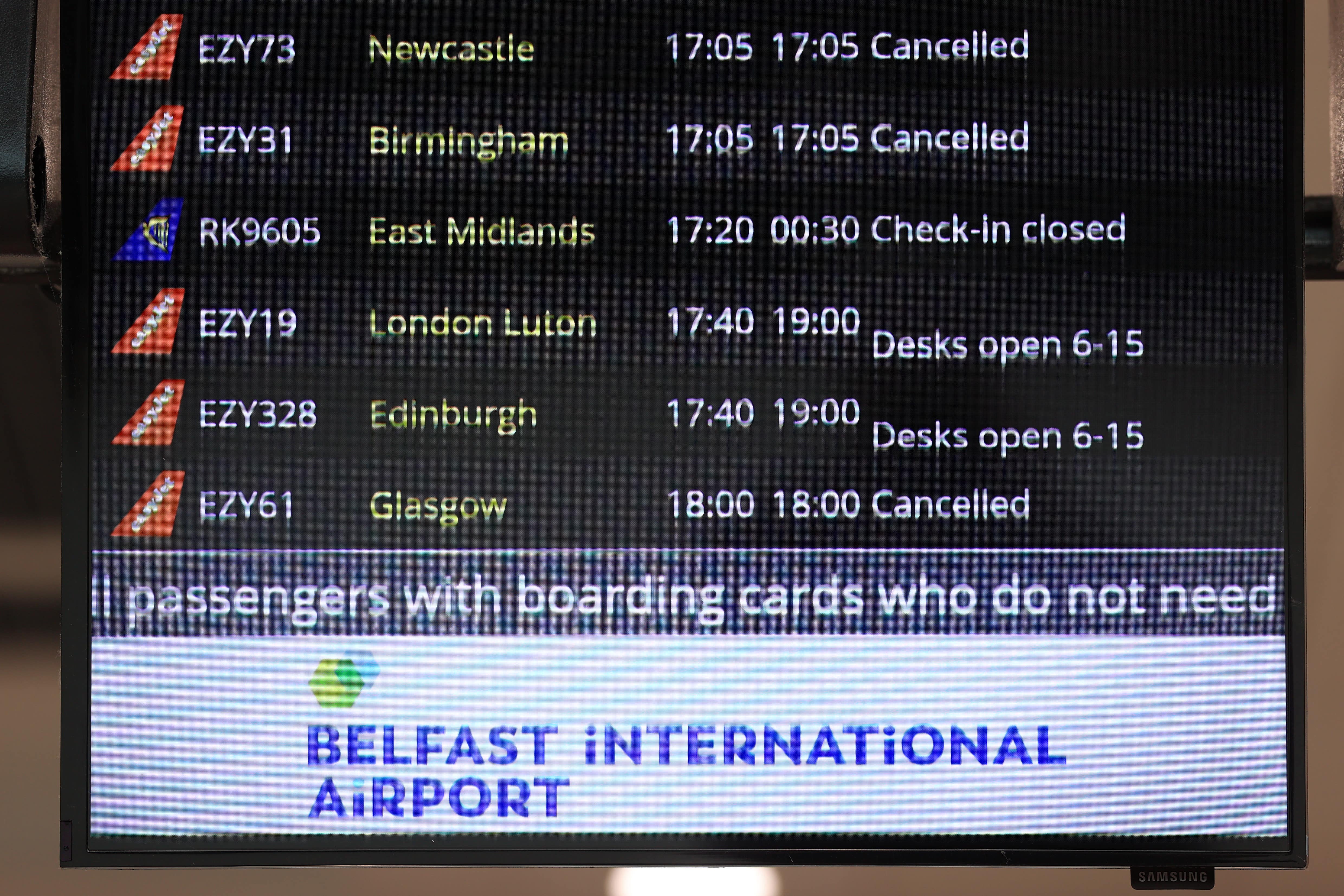 A departure board at Belfast International Airport as flights to the UK and Ireland were cancelled as a result of air traffic control issues in the UK (Liam McBurney/PA)