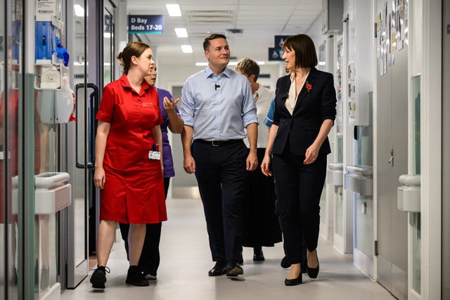 <p>Chancellor of the Exchequer Rachel Reeves and health secretary Wes Streeting speak to staff during a visit to St George’s Hospital, Tooting, last week</p>