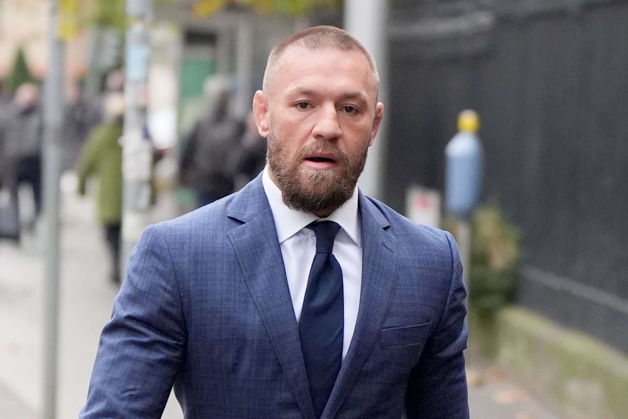 MMA fighter Conor McGregor leaves the High Court in Dublin, where he is appearing for a personal injury case against him