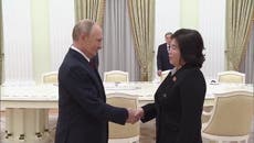 Putin’s awkwardly long handshake with North Korea’s top diplomat