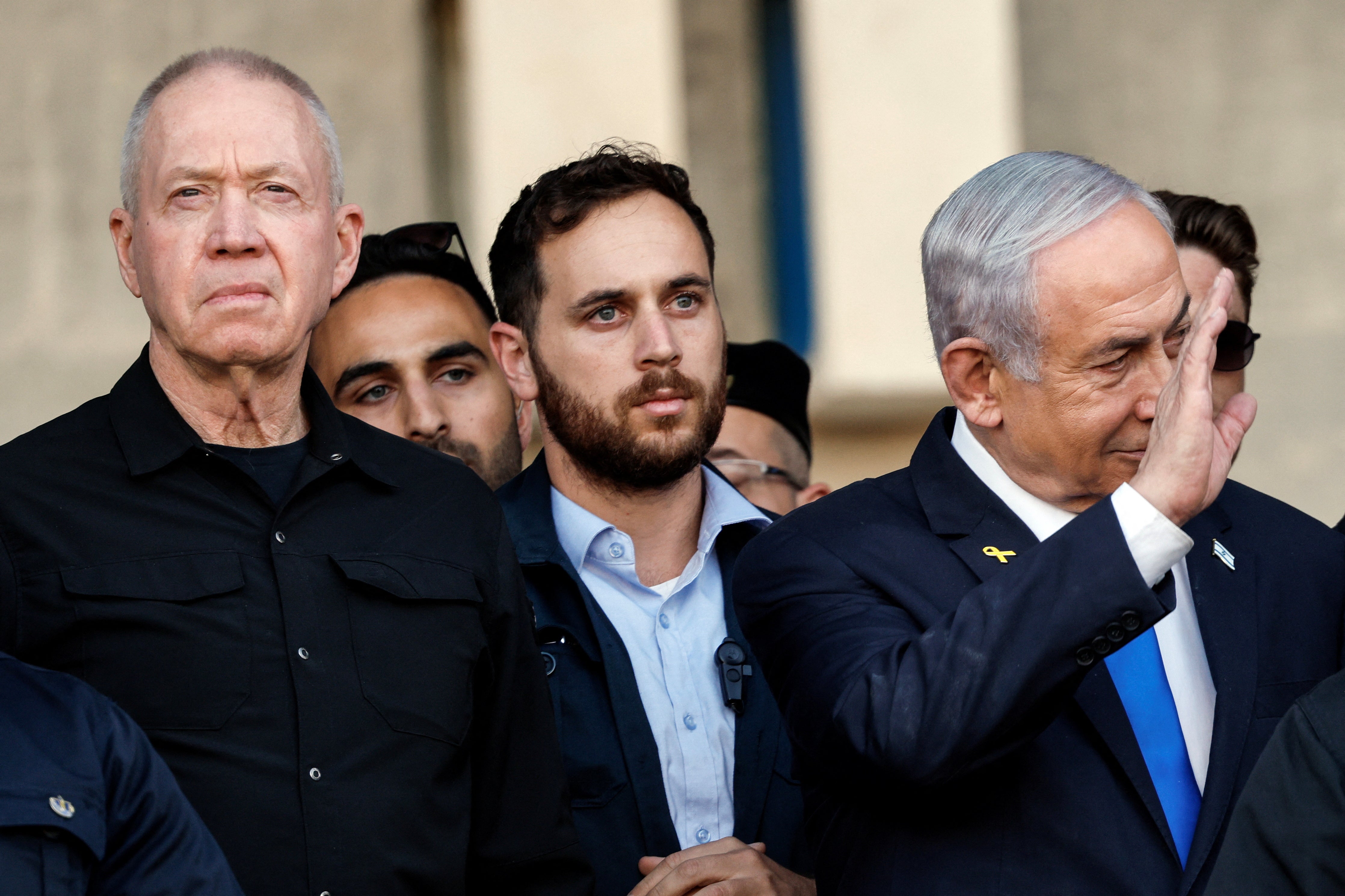 Israeli Prime Minister Benjamin Netanyahu and Israeli Defense Minister Yoav Gallant attend a ceremony for the 70th cohort of military combat officers, at an arm