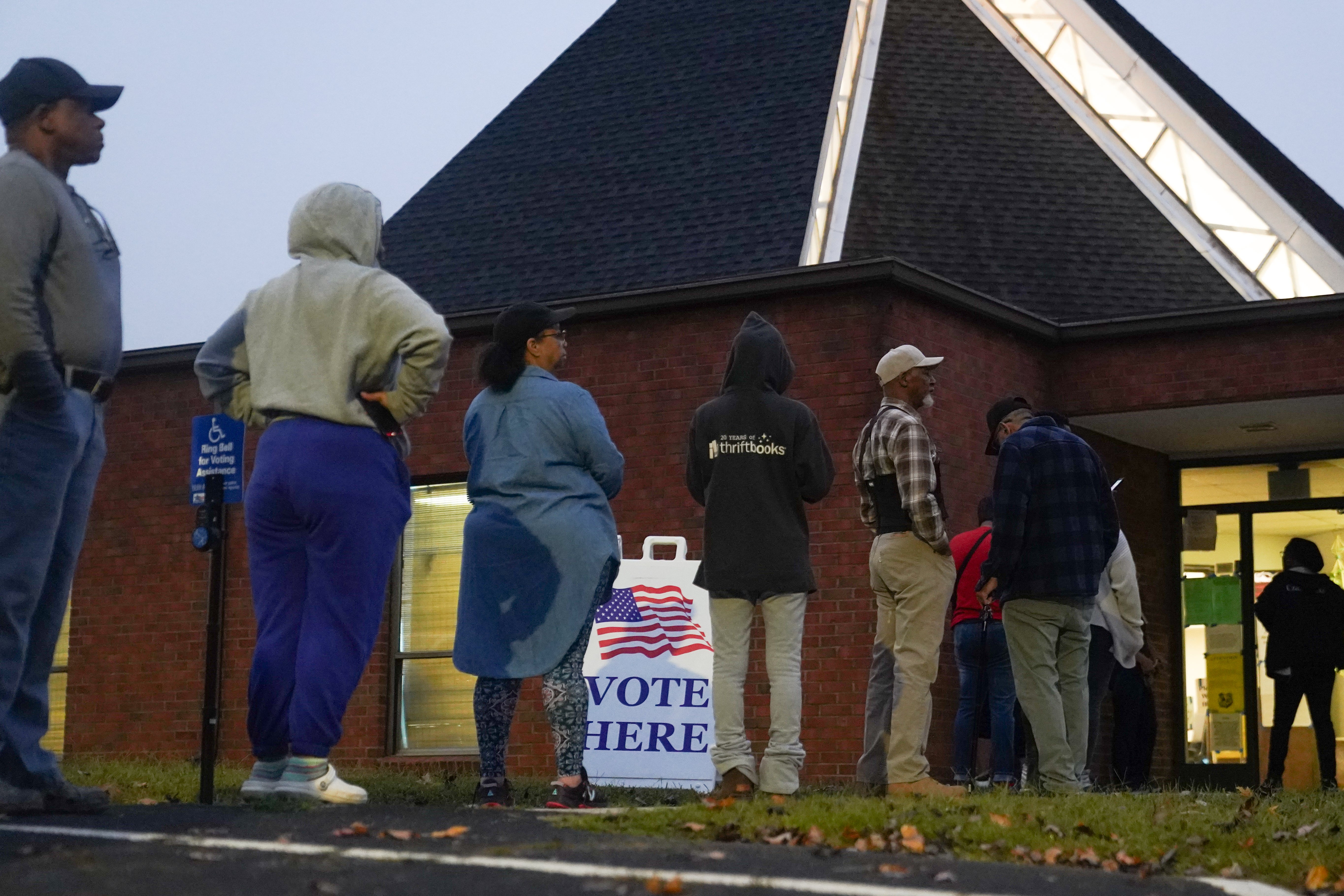 Voters line up in Austell, Georgia to cast their ballots on Election Day. Some Georgia polling centers are receiving bomb threats of ‘Russian origin,’ their secretary of state said on Tuesday