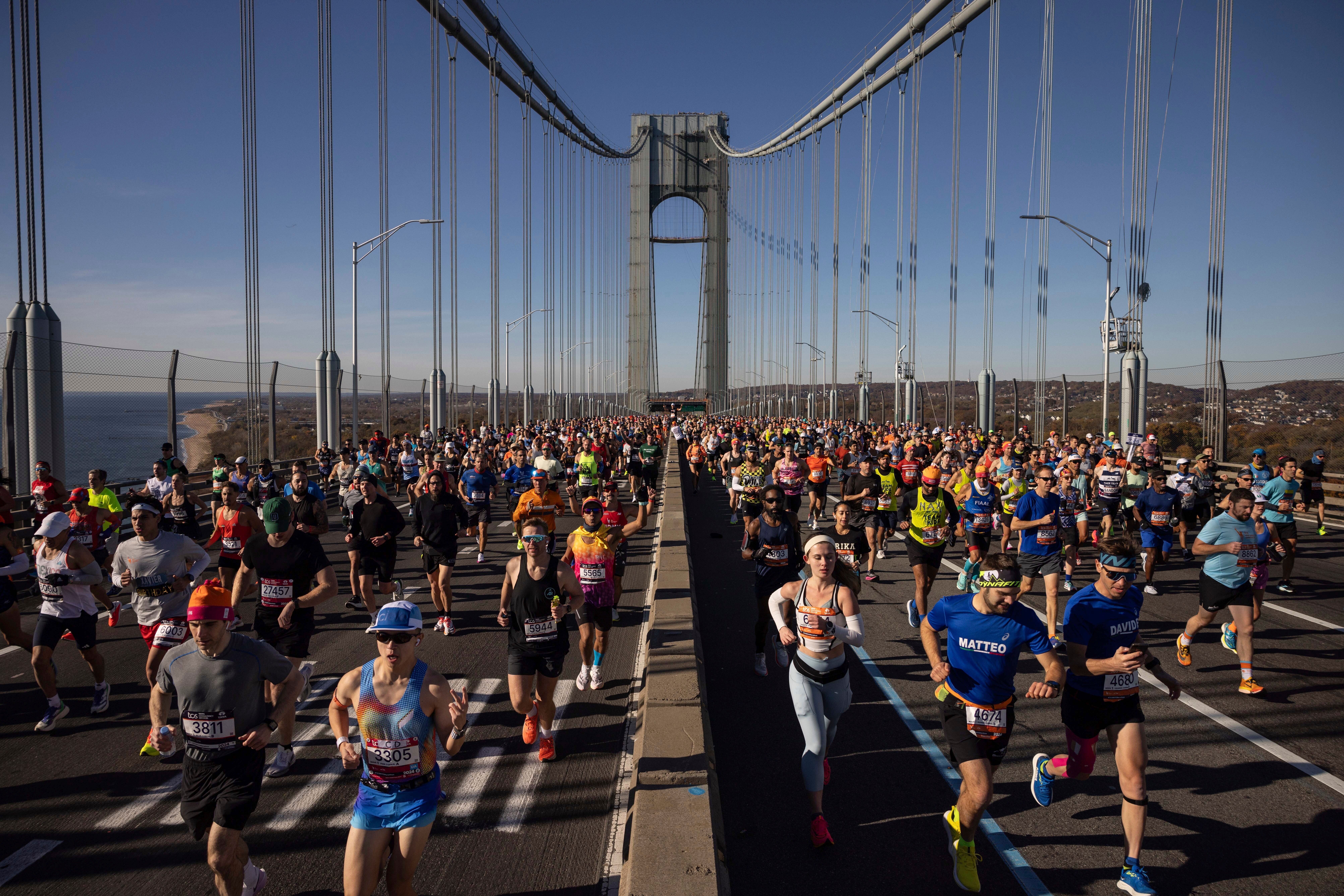 Runners cross the Verrazzano-Narrows Bridge at the start of the New York City Marathon, Sunday, Nov. 3, 2024, in New York. (AP Photo/Yuki Iwamura)