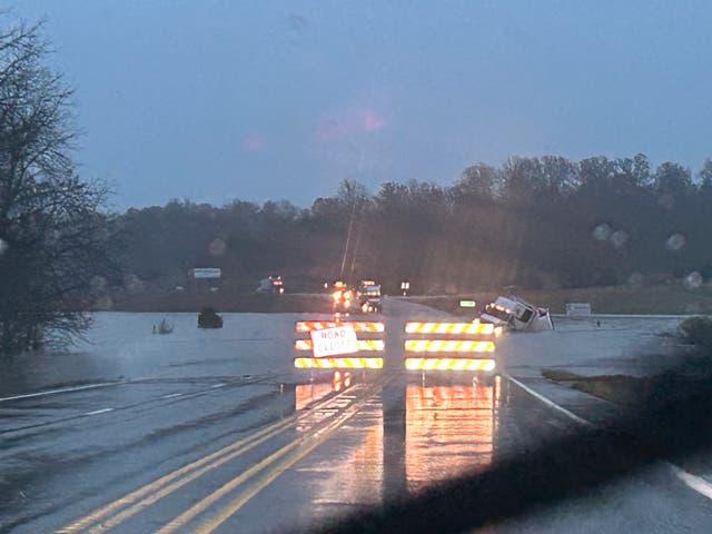 <p>A photo released by the Missouri State Highway Patrol of a tractor trailer sits submerged in flood water</p>