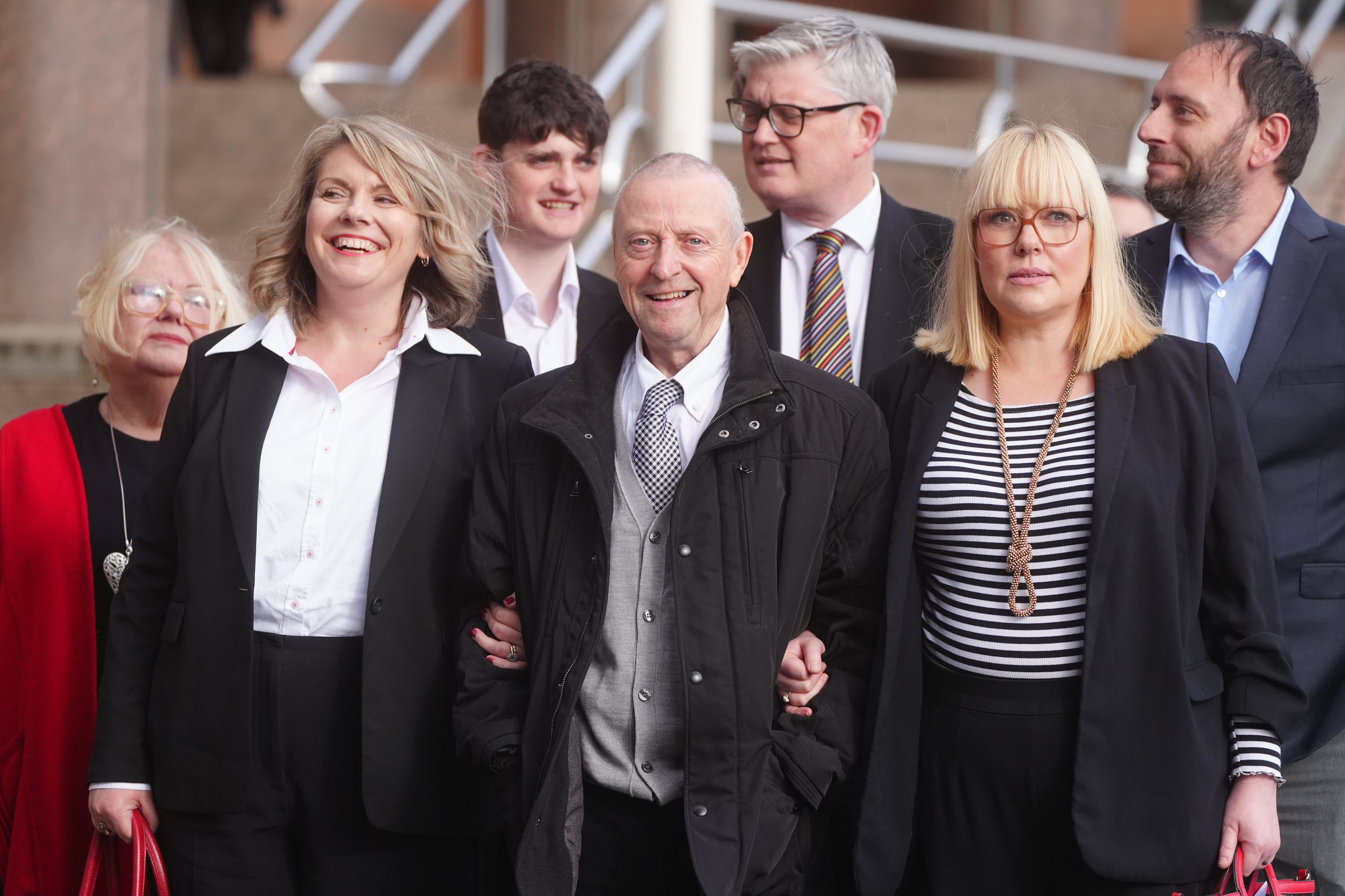 Victim Patrick O’Hara (centre) with supporters at Newcastle Crown Court (Owen Humphreys/PA)