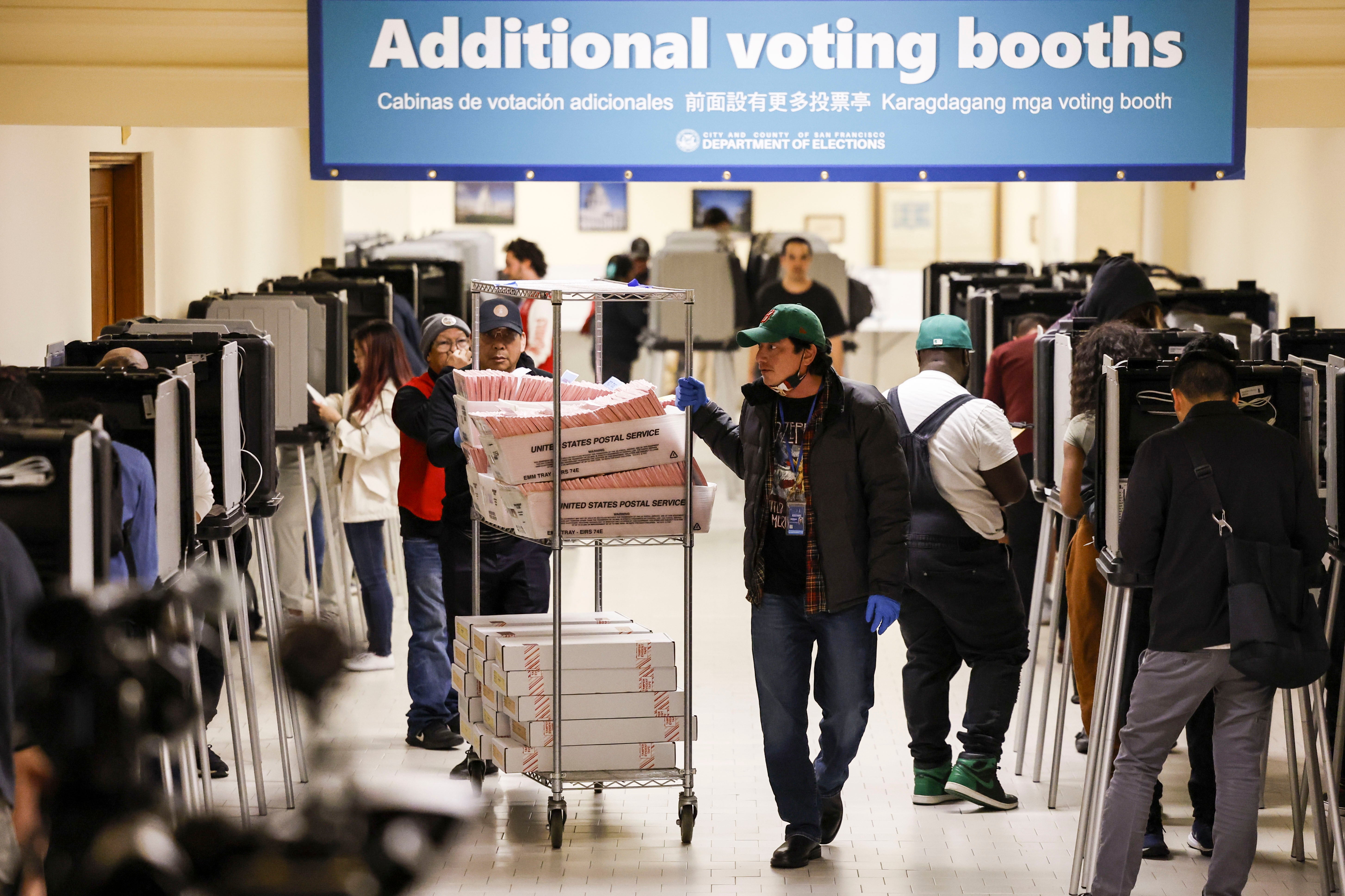 <p>Voters cast ballots at a polling site on Election Day in City Hall in San Francisco, California </p>