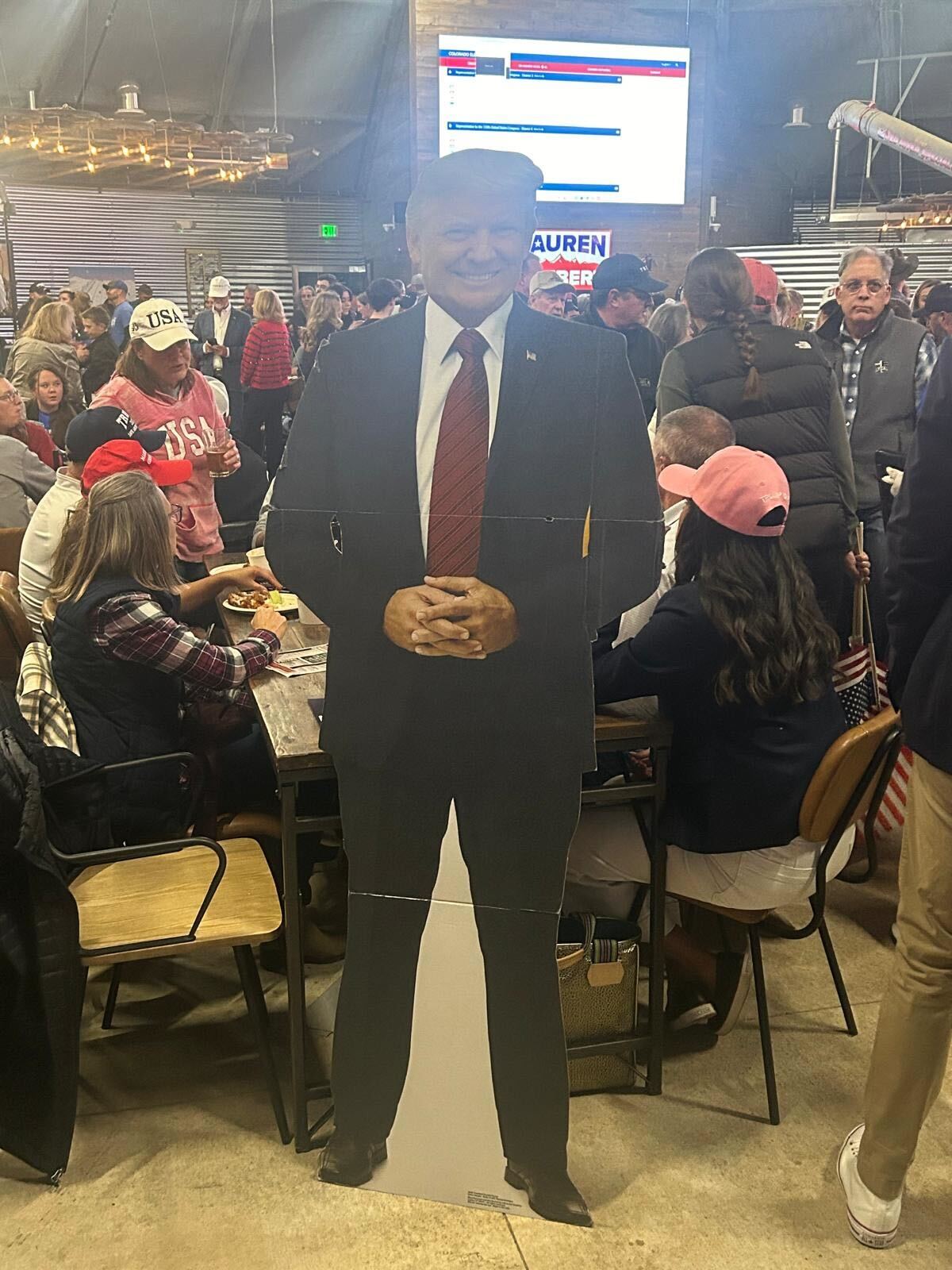 A Donald Trump cutout at the Boebert Watch Party