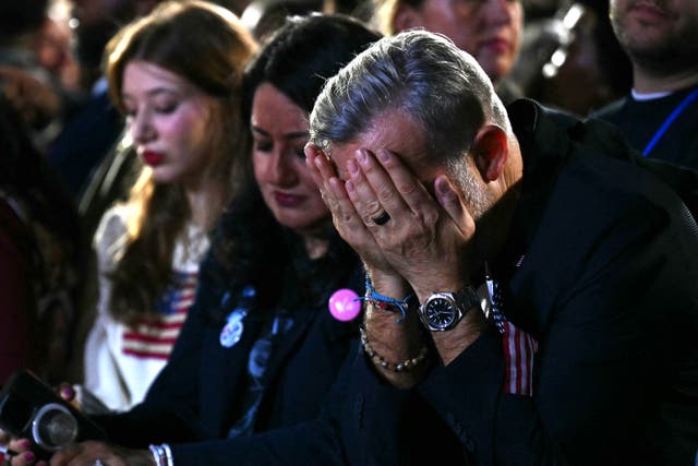 <p>A supporter reacts to election results during an election night event for US Vice President and Democratic presidential candidate Kamala Harris at Howard University in Washington, DC, on November 5, 2024</p>