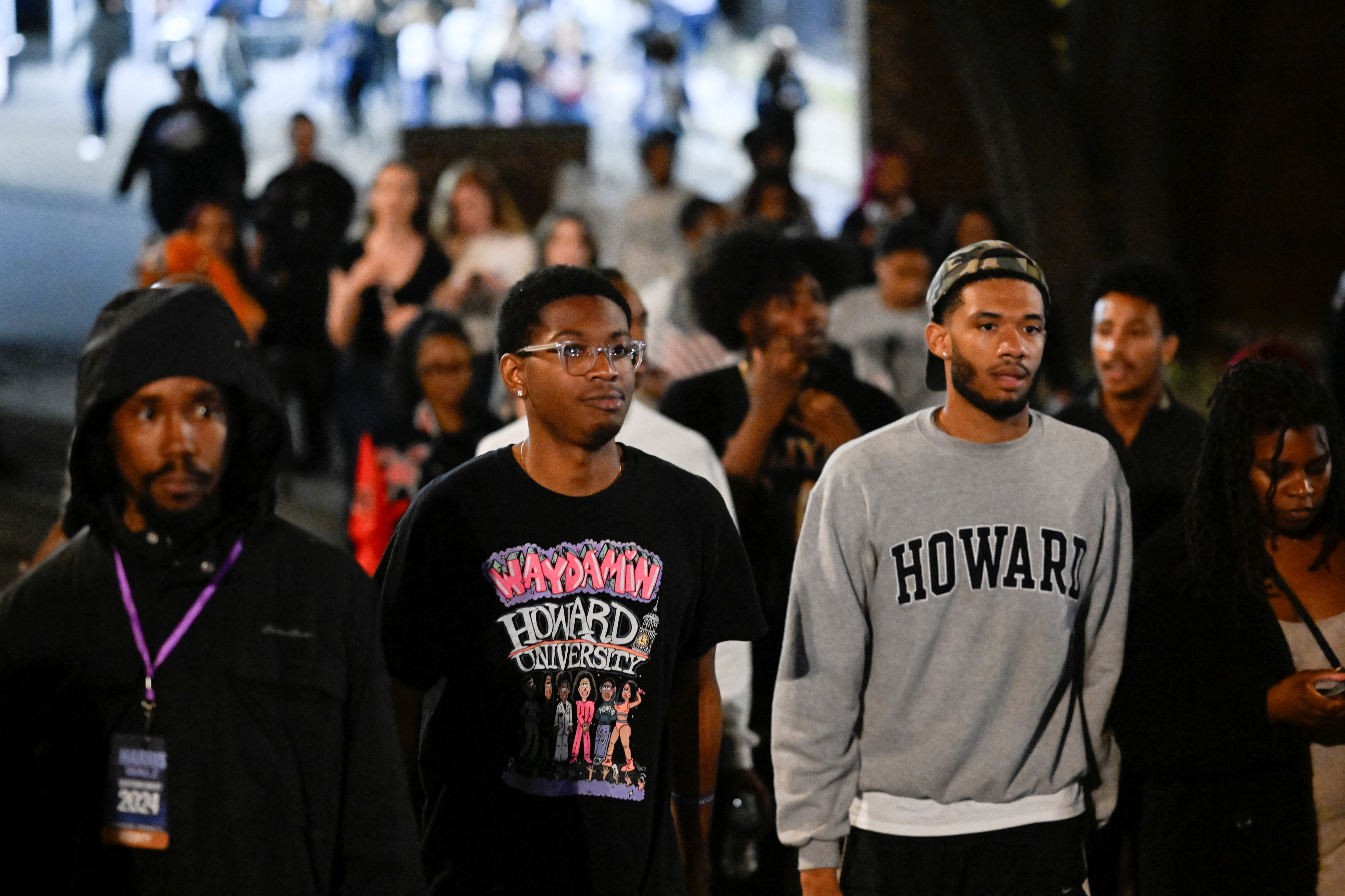 People leave the election night rally for US Democratic presidential nominee Kamala Harris, outside Howard University in Washington, DC