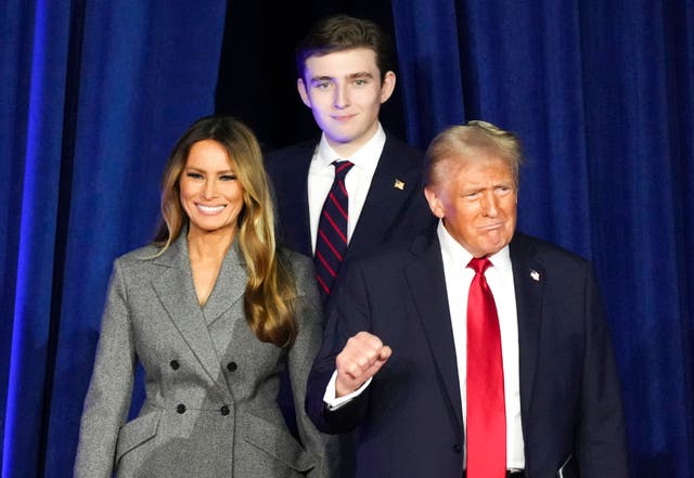 <p>Barron Trump pictured with his parents Melania and Donald Trump during an election night party  </p>