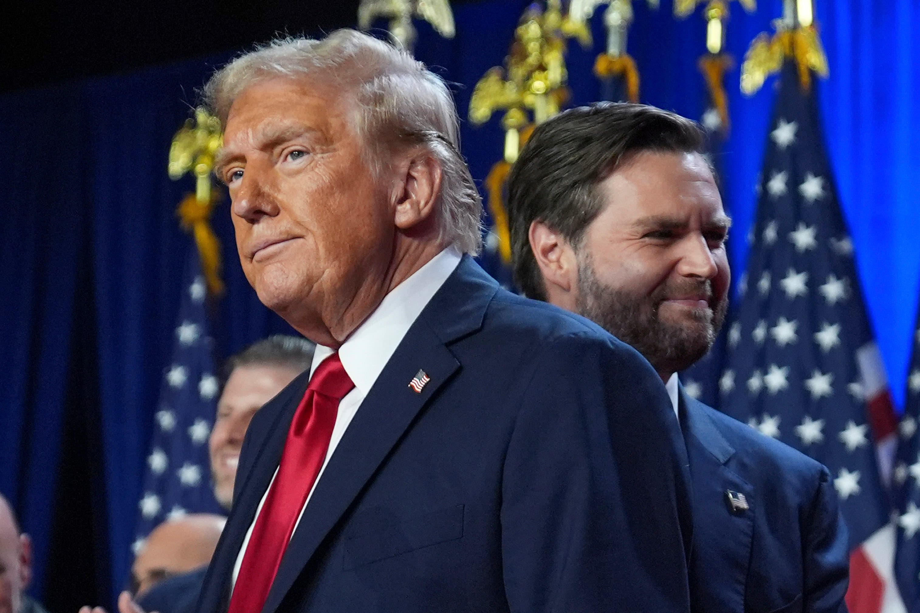 Republican presidential nominee former President Donald Trump greets Republican vice presidential nominee JD Vance in Florida (Evan Vucci/AP)