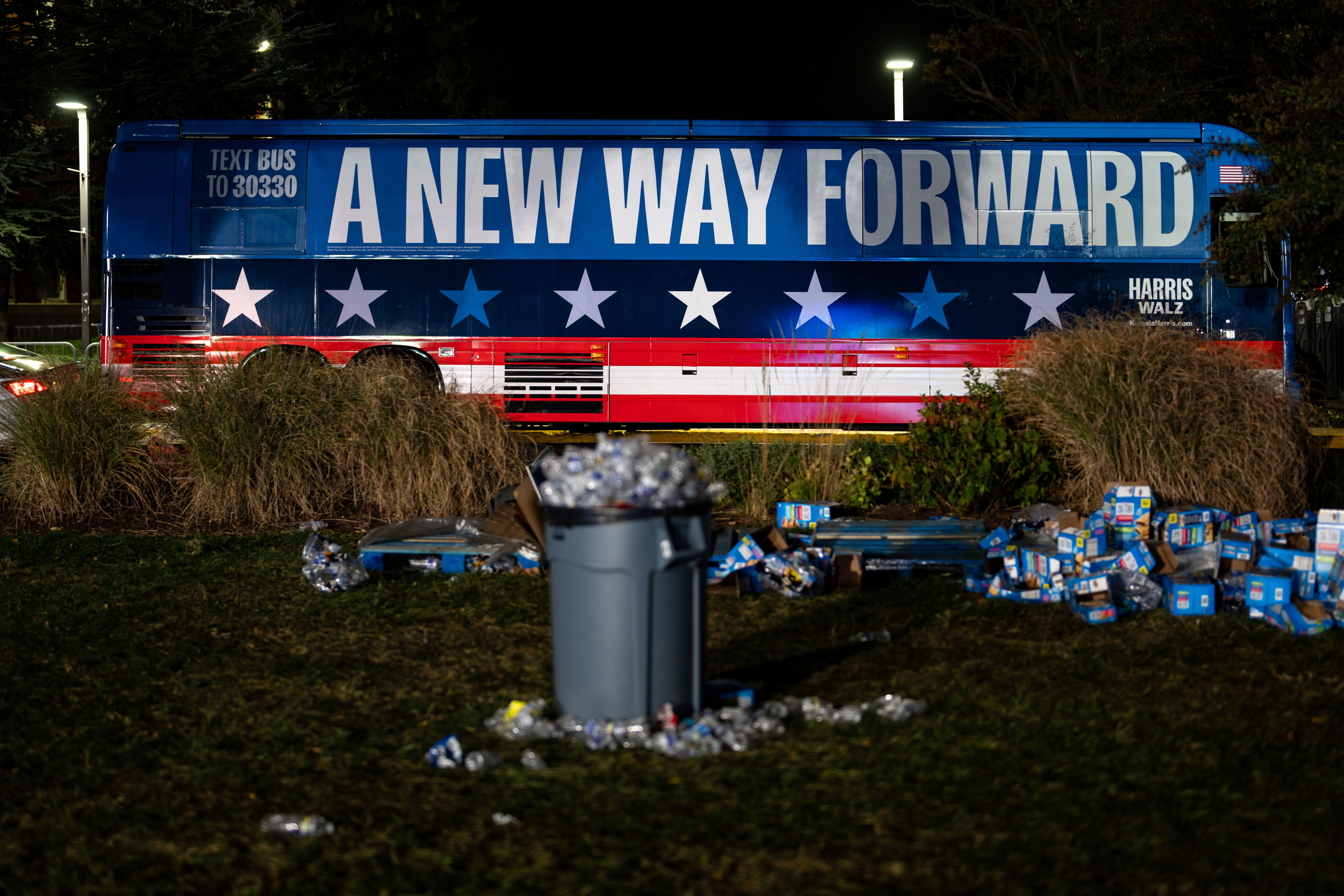 Chairs and trash in an empty field following a Harris election night watch party at Howard University, Washington DC