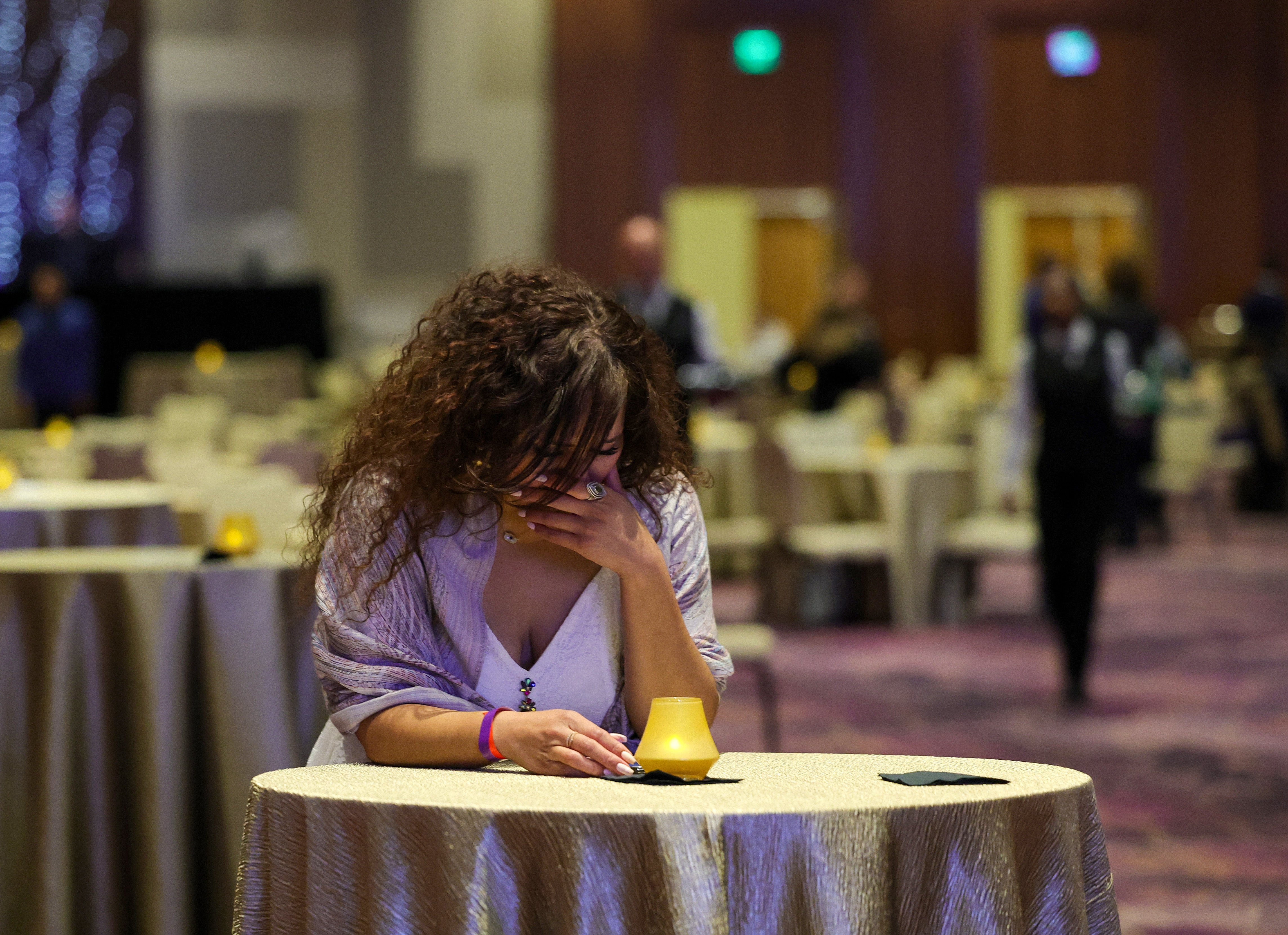 An activist cries at the Nevada Democratic Party’s election results watch party