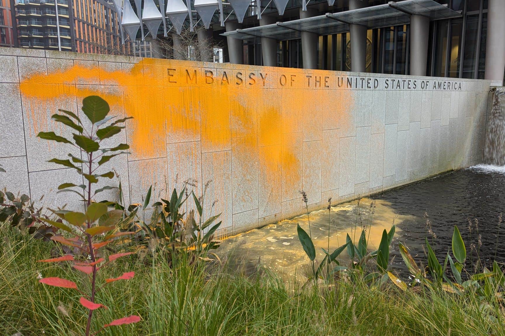 Just Stop Oil supporters have painted the US embassy building in London orange, as Donald Trump claimed victory in the presidential election (Just Stop Oil/PA)