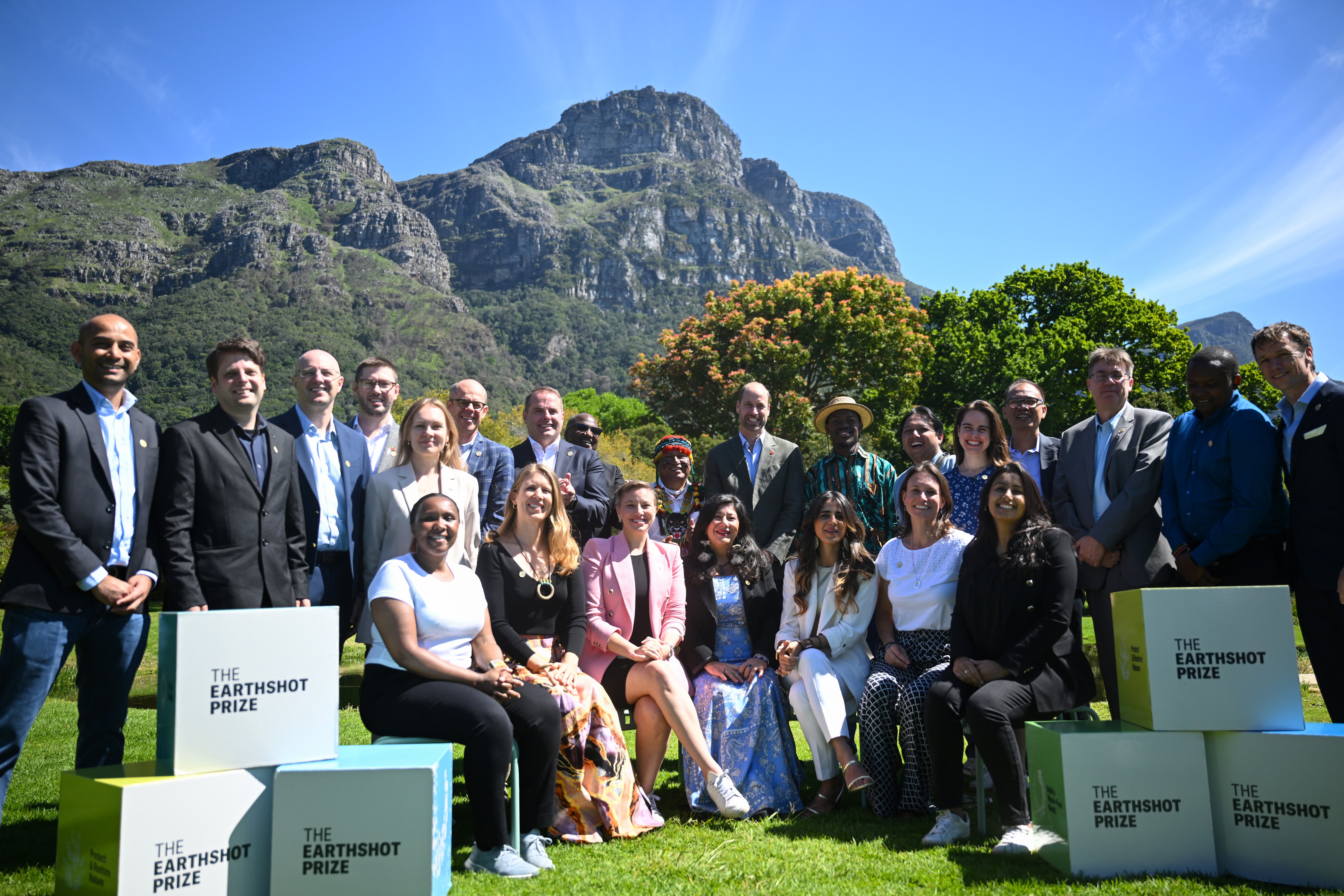 The Prince of Wales (standing centre right) poses with the 2024 Earthshot Prize finalists during a visit to the Kirstenbosch National Botanical Garden in Cape Town