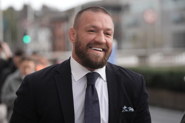 <p>Mixed martial arts fighter Conor McGregor outside the High Court in Dublin</p>