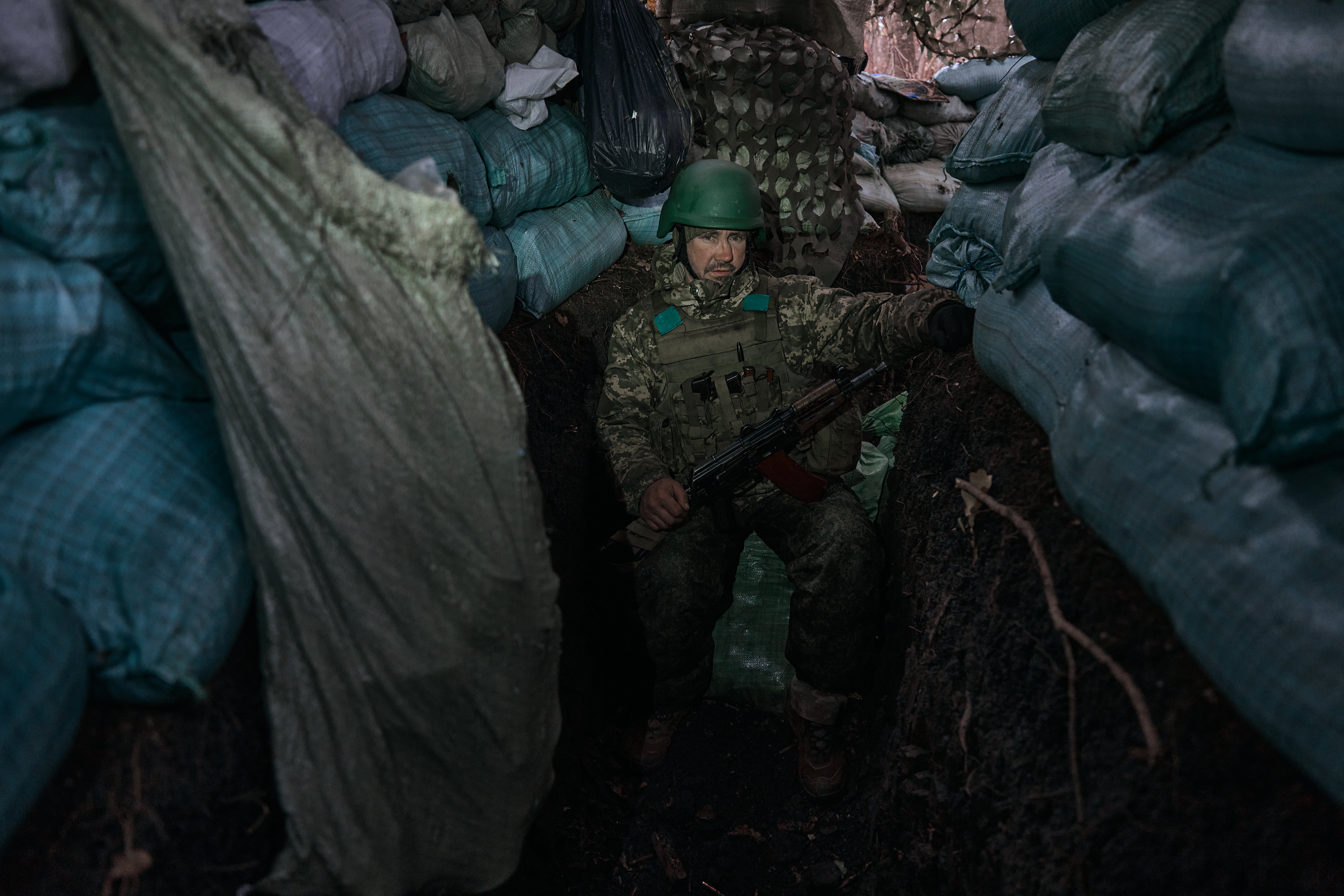 A soldier in a trench 100 meters from the Russian positions in the Serebryansky forest on November 6, 2024 in Serebryansky Reserve, Ukraine. The forest is located about 8 kilometers southwest of Kreminna in the Luhansk Oblast Ukraine