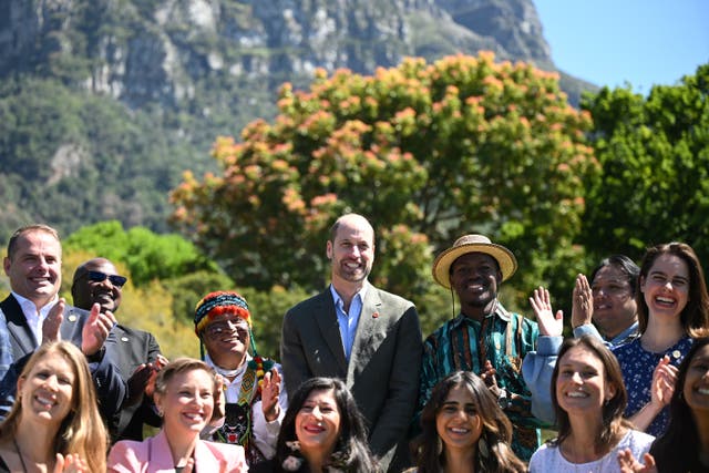 The Prince of Wales poses with the 2024 Earthshot Prize finalists (Victoria Jones/PA)