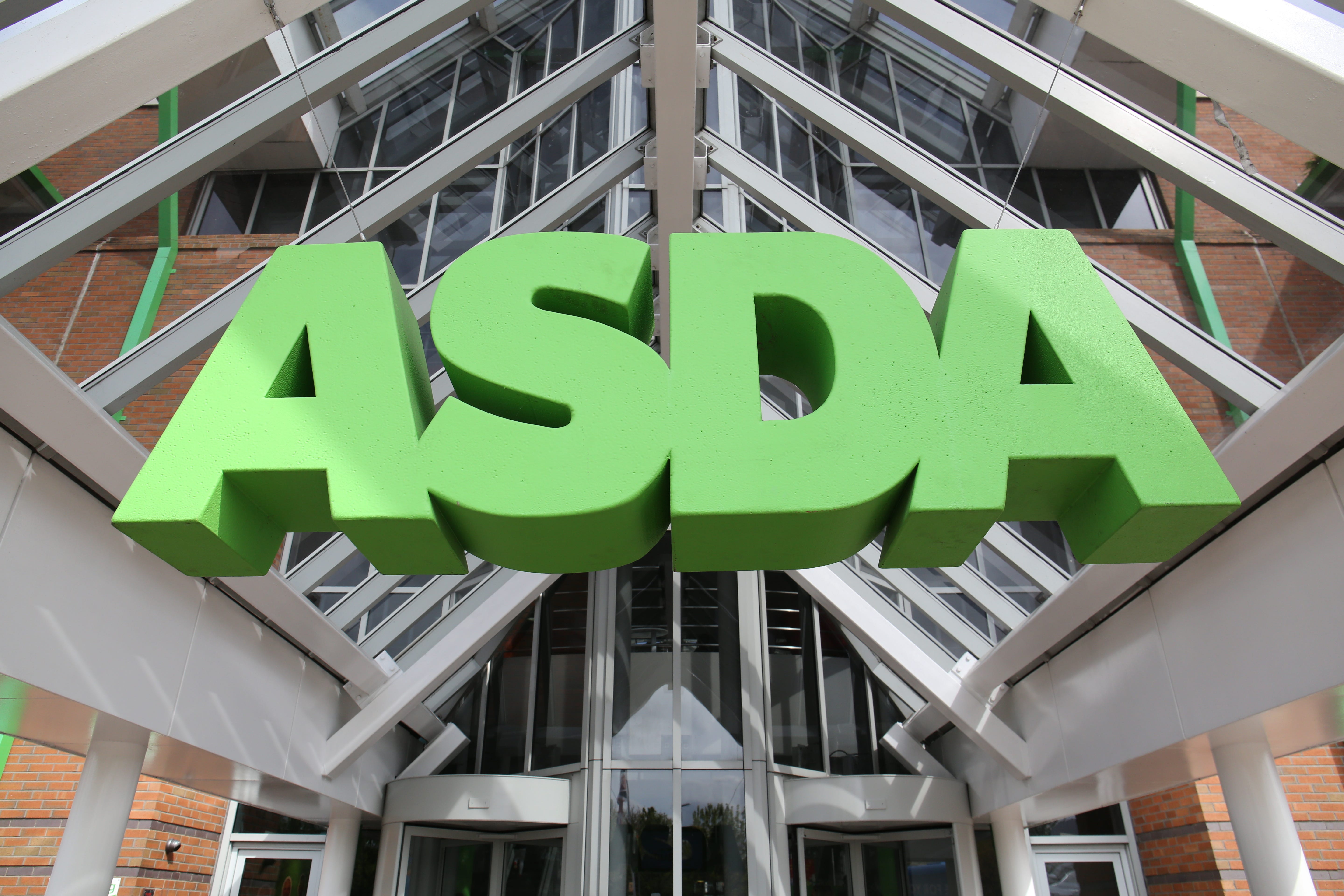 Undated file photo of the Asda sign. Asda has said it will cut 475 jobs (Chris Radburn/PA)