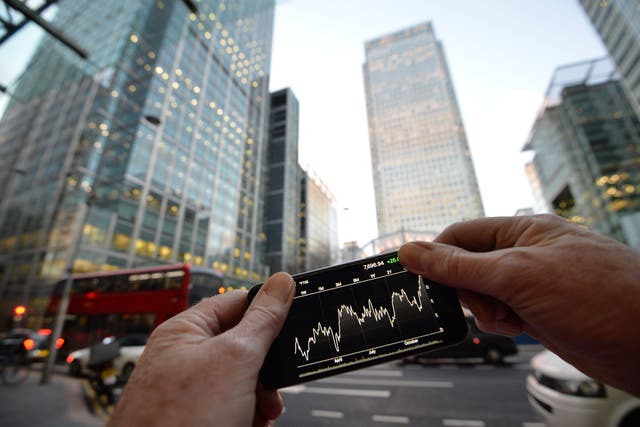 Stocks in the UK and Europe handed back early gains later in trading on Wednesday (John Stillwell/PA)