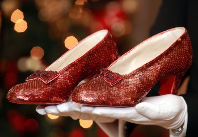 <p>Ruby Red Slippers worn by Judy Garland in ‘The Wizard of Oz’ on display in New York in 2011</p>