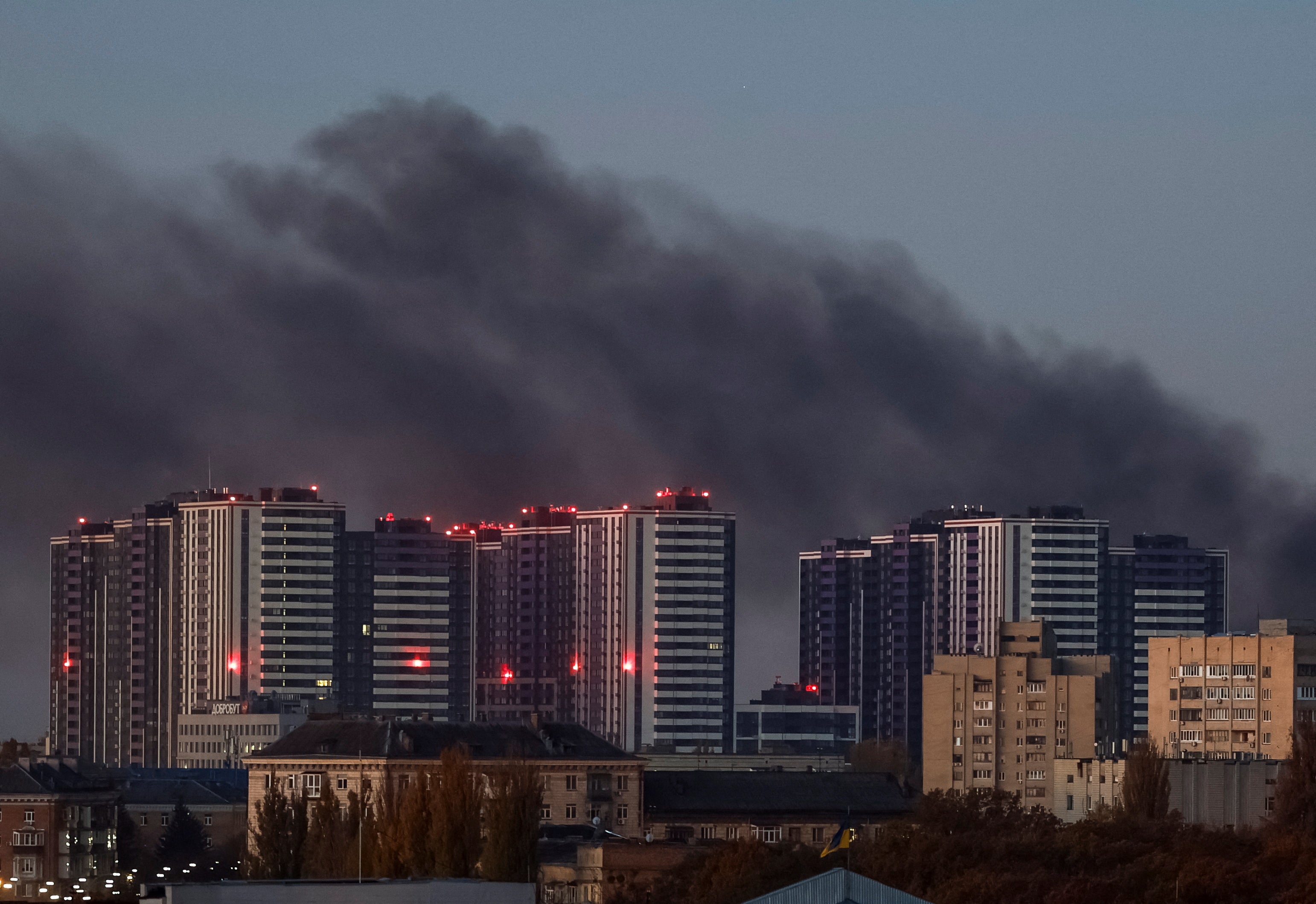 Smoke rises in the sky over the city after a Russian drone strike, amid Russia's attack on Ukraine, in Kyiv, Ukraine