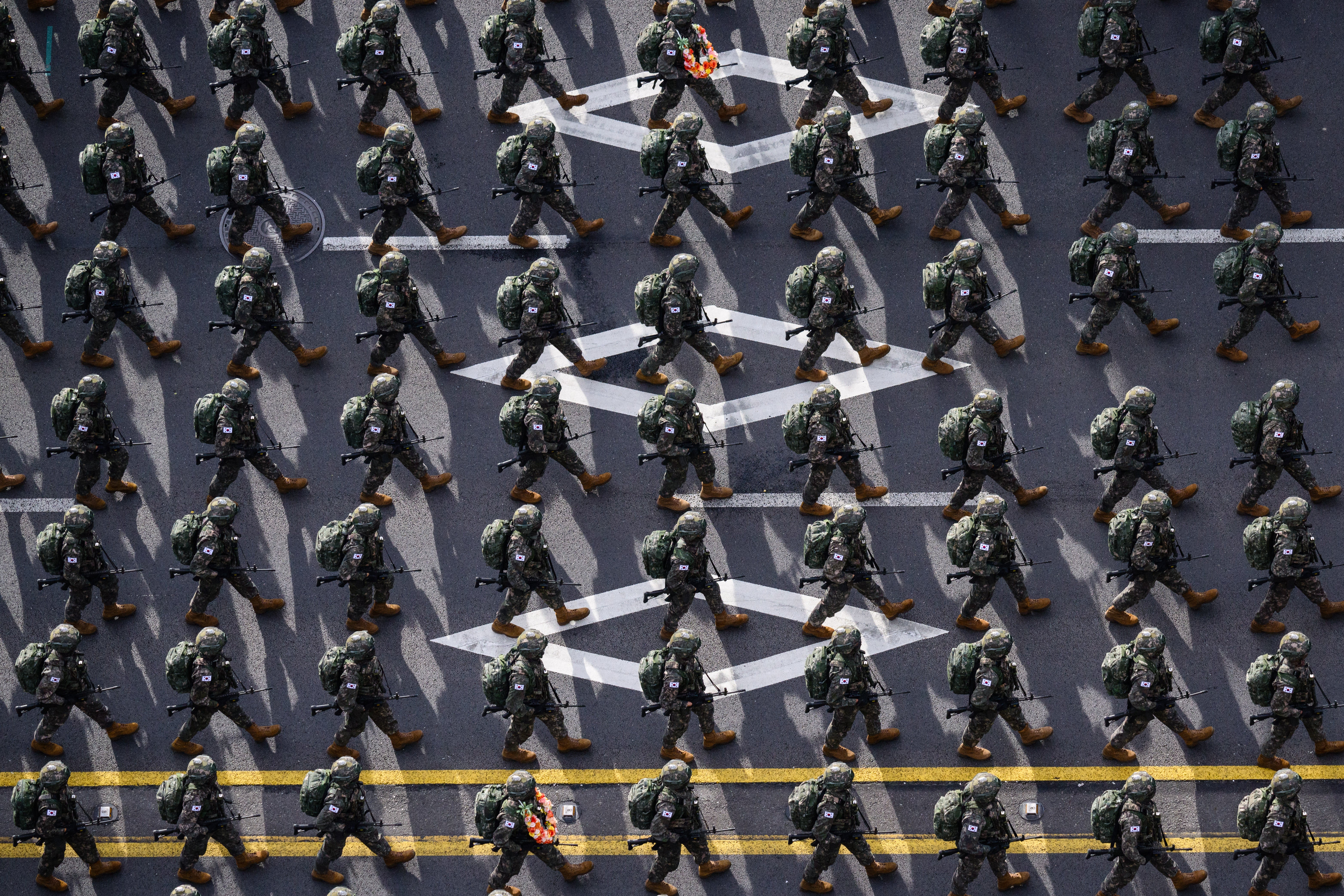 Soldiers march during a military parade to celebrate South Korea’s 76th Armed Forces Day in Seoul