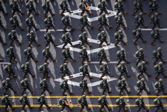 <p>Soldiers march during a parade to celebrate South Korea’s 76th Armed Forces Day in Seoul</p>