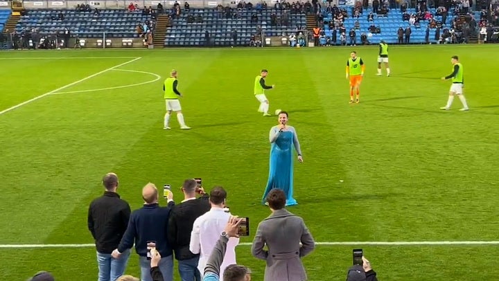 <p>Football fan on stag do sings Frozen karaoke in front of entire stadium.</p>