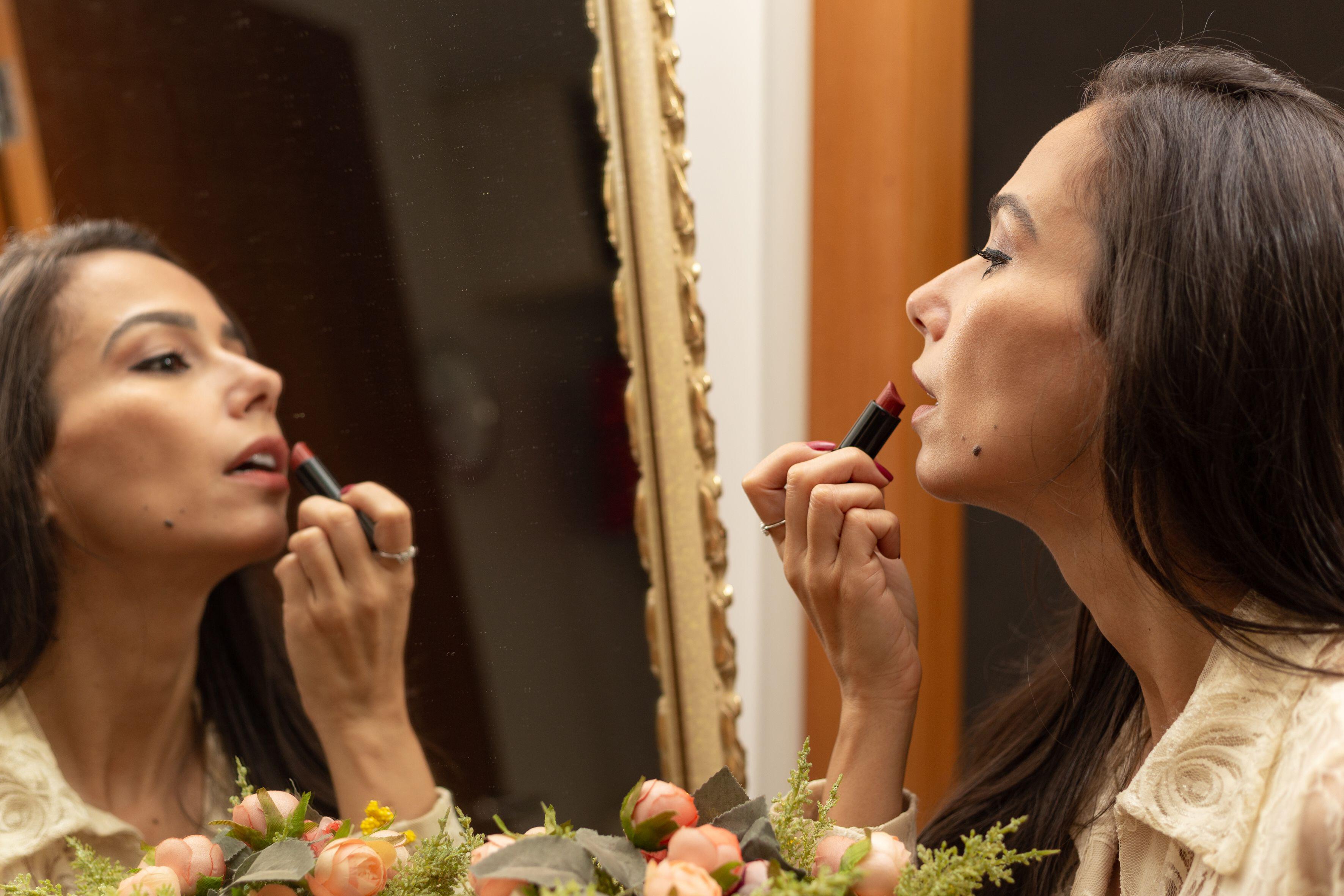 Waxy lipsticks can dry out your lips causing cracks and flakiness (Alamy/PA)