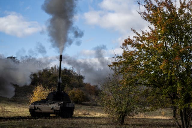 <p>Ukrainian service members of the 43rd Hetman Taras Triasylo Separate Artillery Brigade fire towards Russian troops in a Panzerhaubitze 2000 self-propelled howitzer at a position in Donetsk region, Ukraine</p>