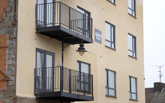 <p>A view of Adisa House, a new block of flats under construction in Gillingham, Kent, where developers have had to build around an existing lamp post to remain within construction deadlines</p>