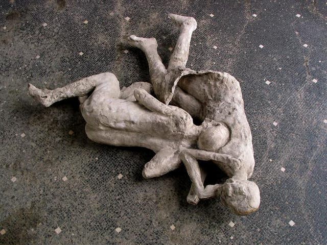 <p>Body casts of victims from Pompeii are seen in this image. Researchers extracted ancient DNA from the casts of Pompeii victims to learn more about them. </p>