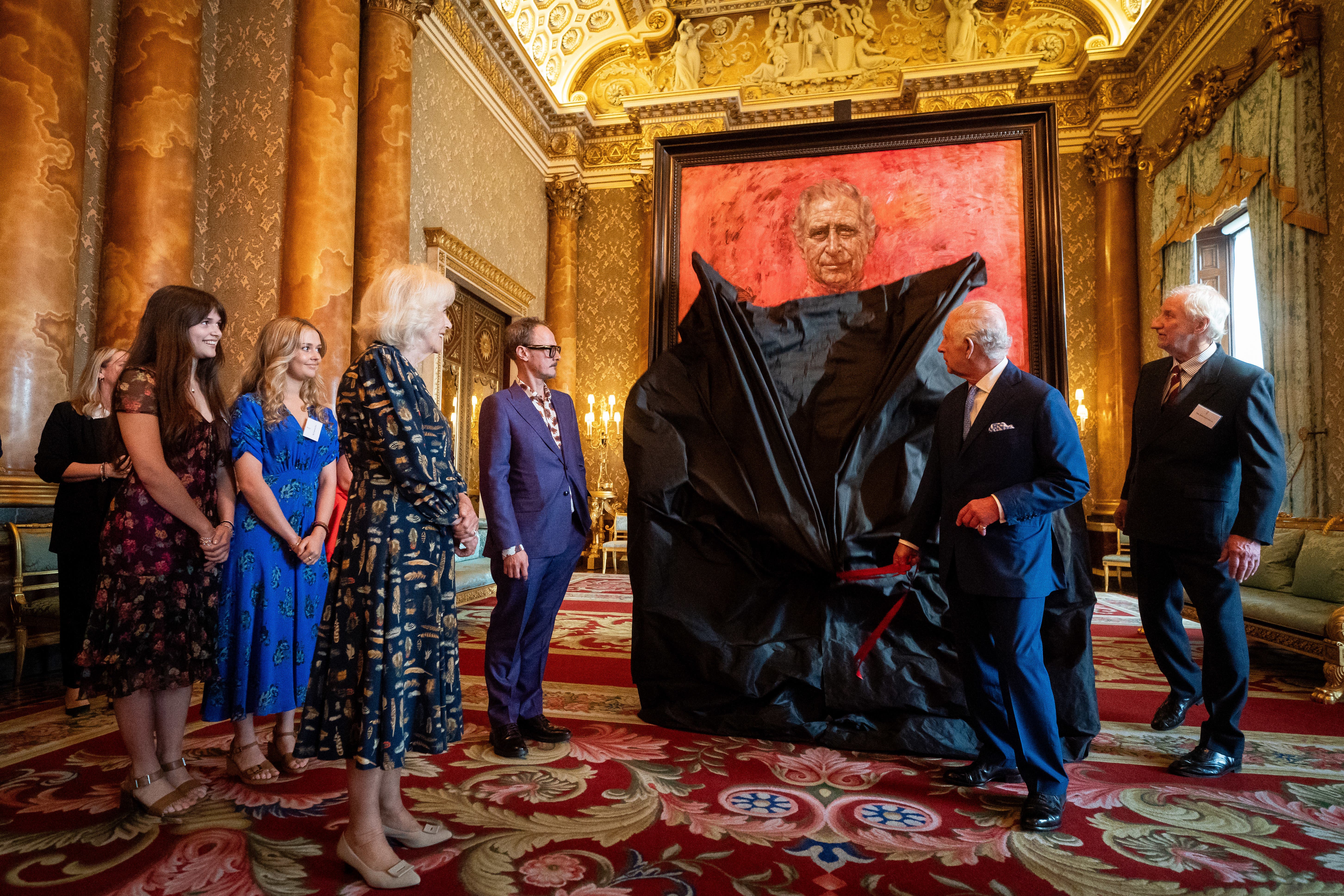 King Charles III and Queen Camilla at the unveiling of artist Jonathan Yeo’s portrait of the King (Aaron Chown/PA)