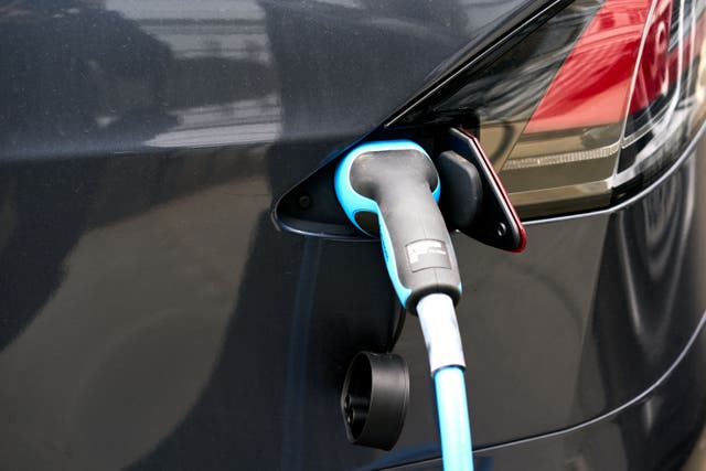 An electric car at a London EV charging point (John Walton/PA)