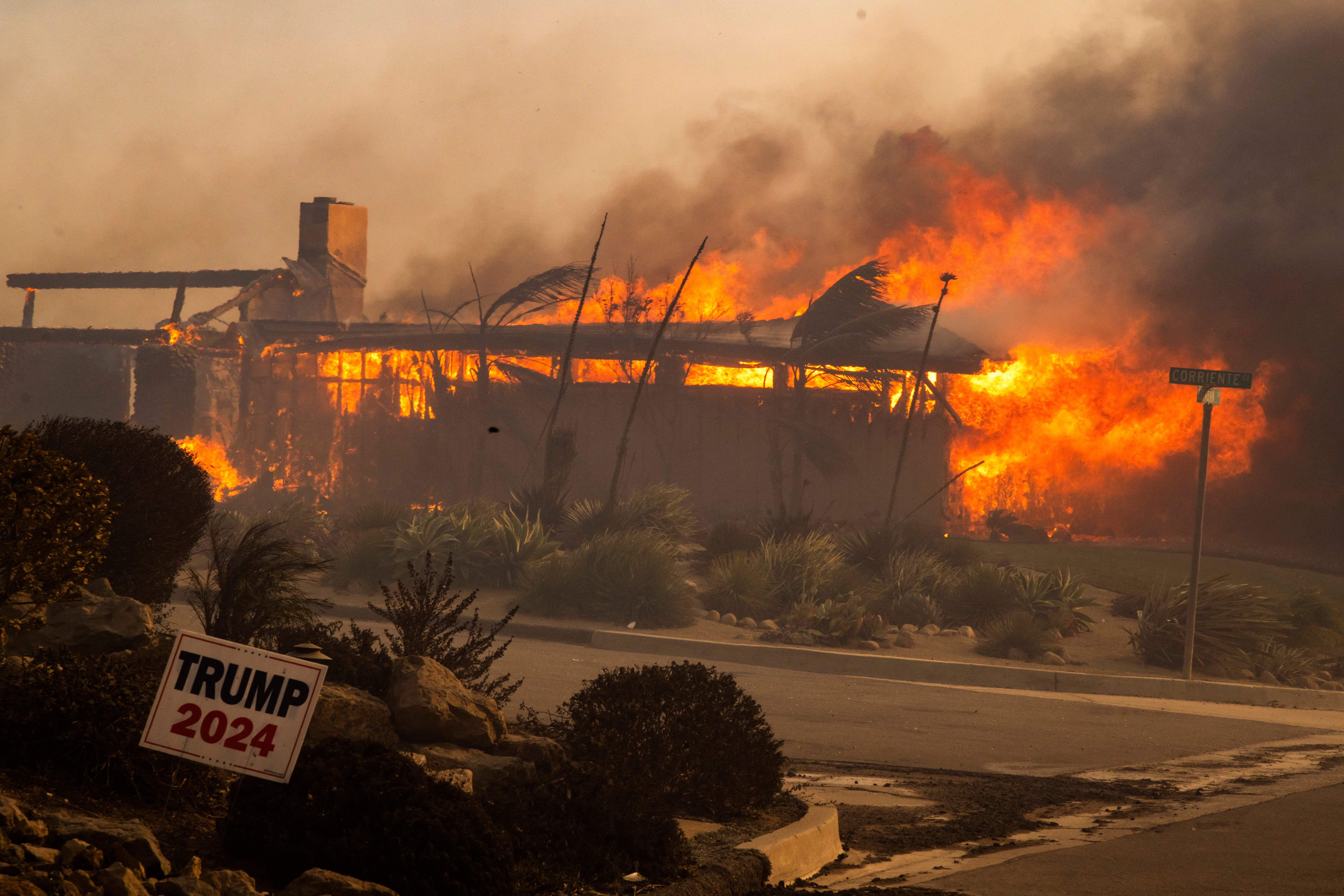 A home burns in the Mountain Fire near Camarillo, California. The fire started Wednesday amid extreme conditions fueled by the Santa Ana winds.