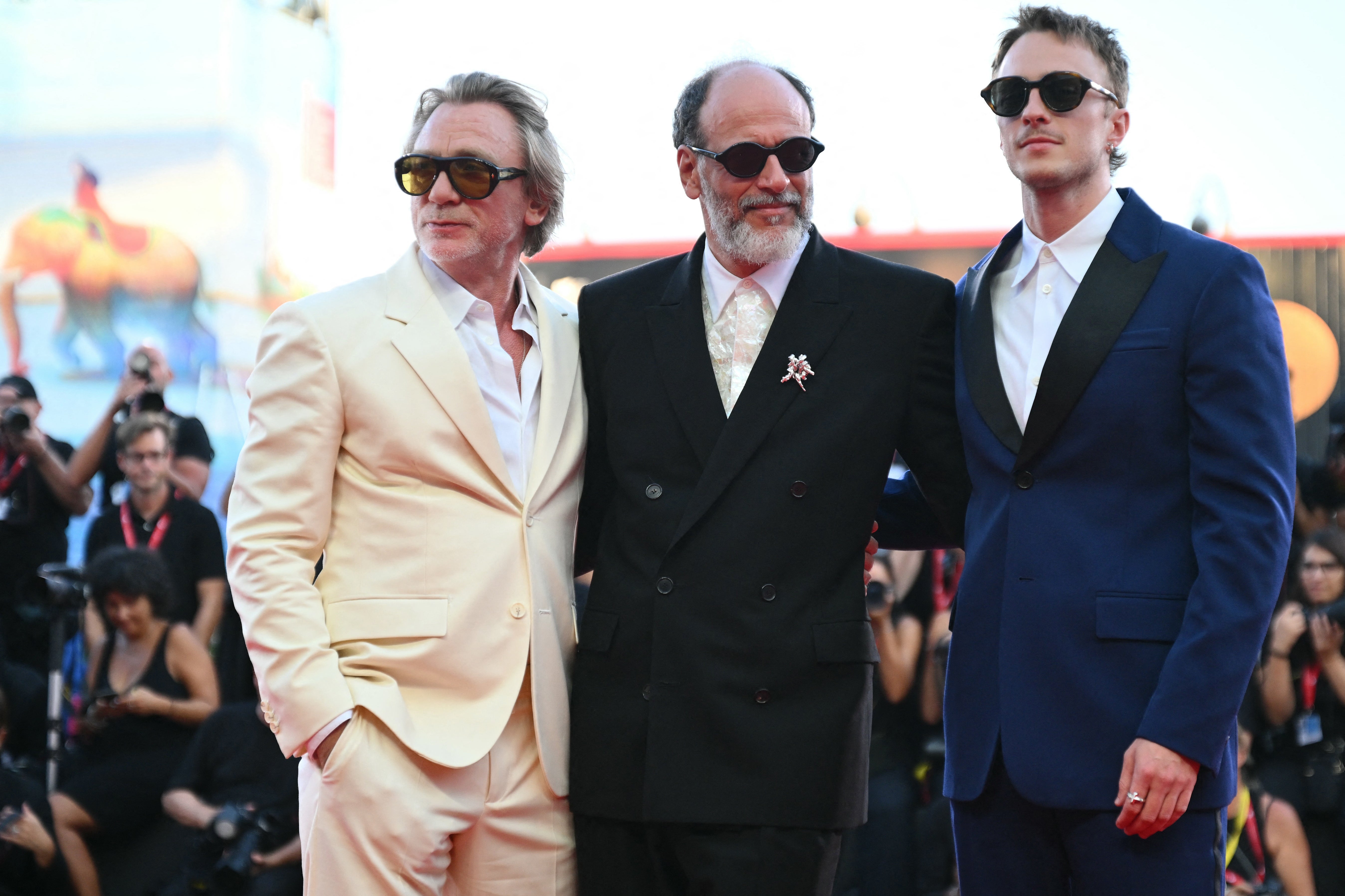 Daniel Craig, Luca Guadagnino, and Drew Starkey at the 81st International Venice Film Festival