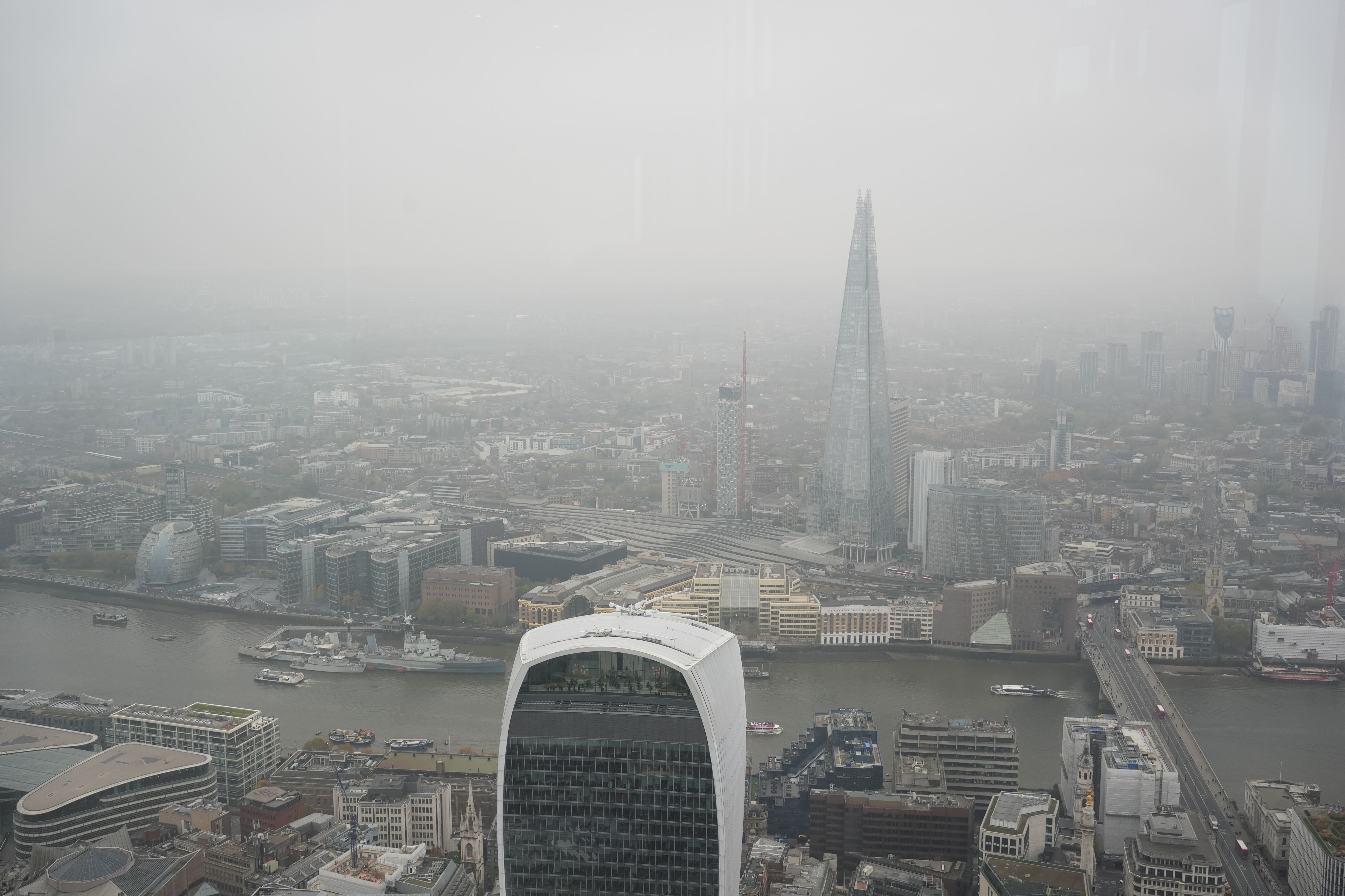 A view across London from the viewing platform of Horizon 22 in Bishopsgate, as the sky is rendered grey (Jordan Pettitt/PA)