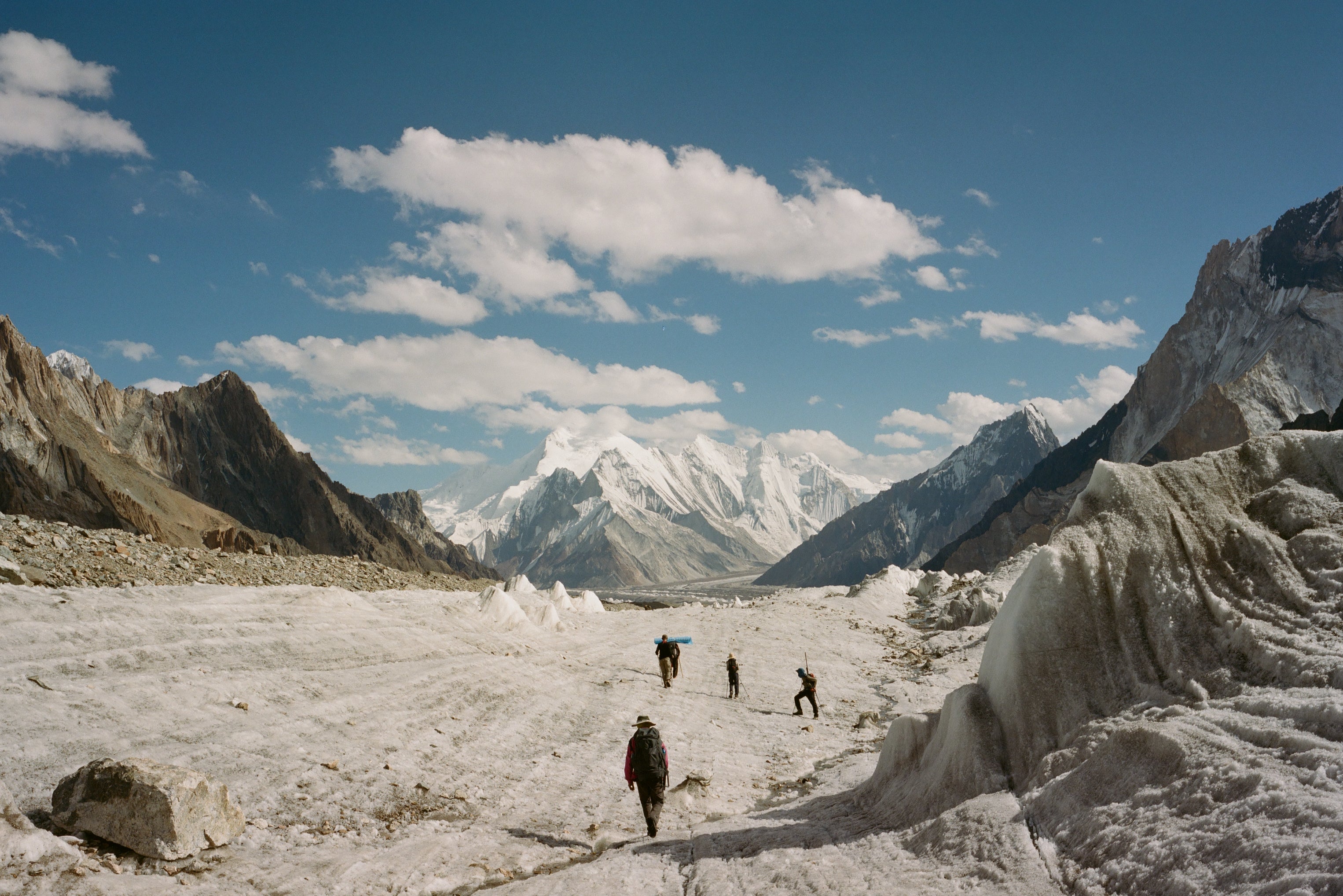 Walking back from K2 base camp along the Godwin-Austen Glacier, facing Chogolisa Peak