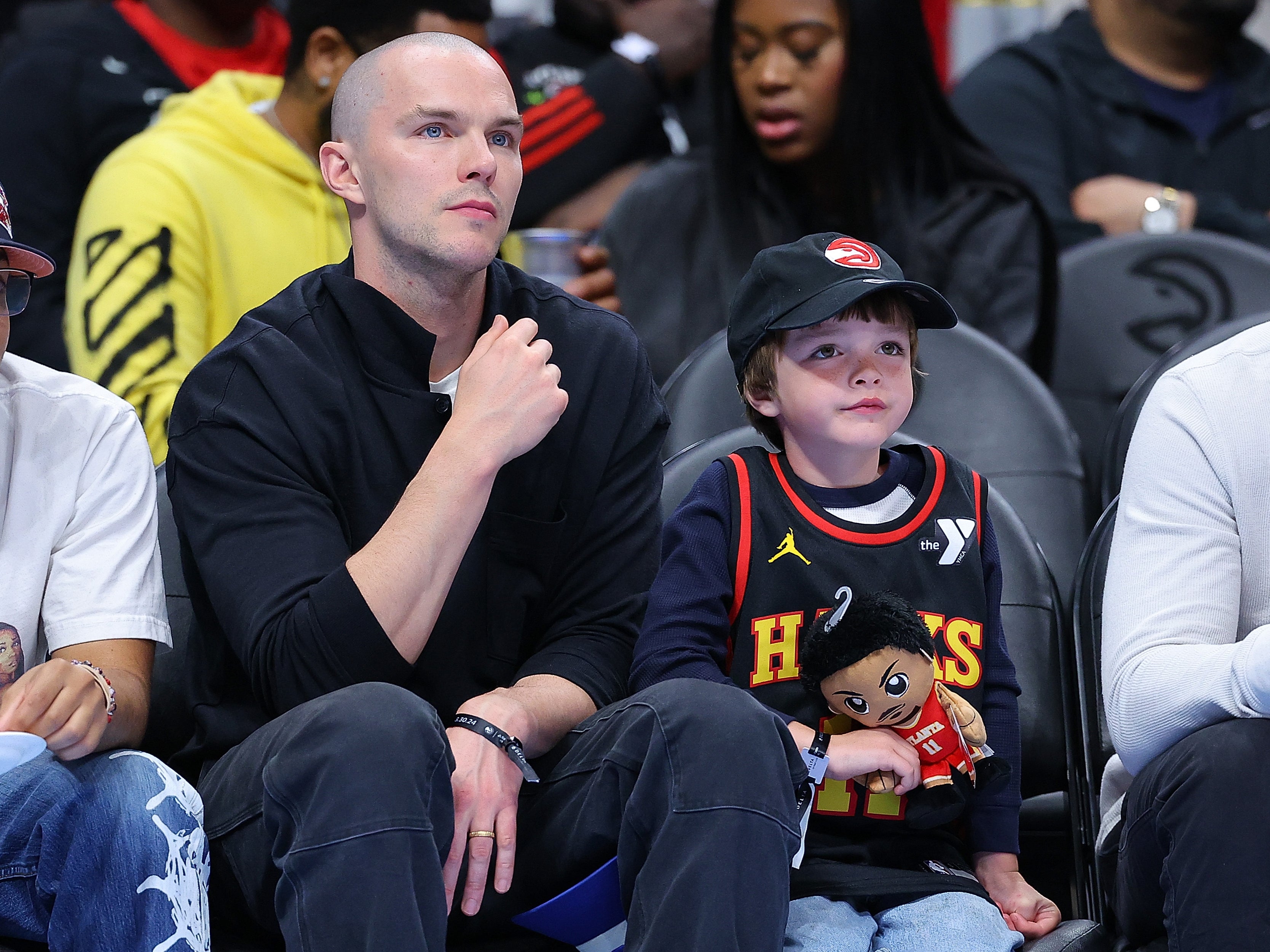 Nicholas Hoult and his son Joaquin, five, attend Atlanta Hawks game in March 2024