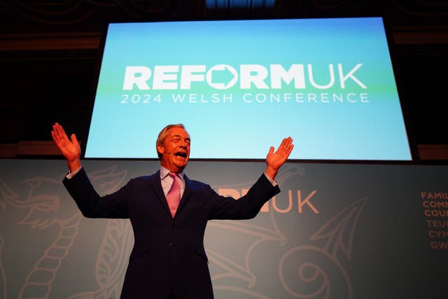 <p>Leader of Reform UK Nigel Farage speaking at the Reform UK Welsh Conference at the Celtic Manor hotel in Newport. (Ben Birchall/PA)</p>