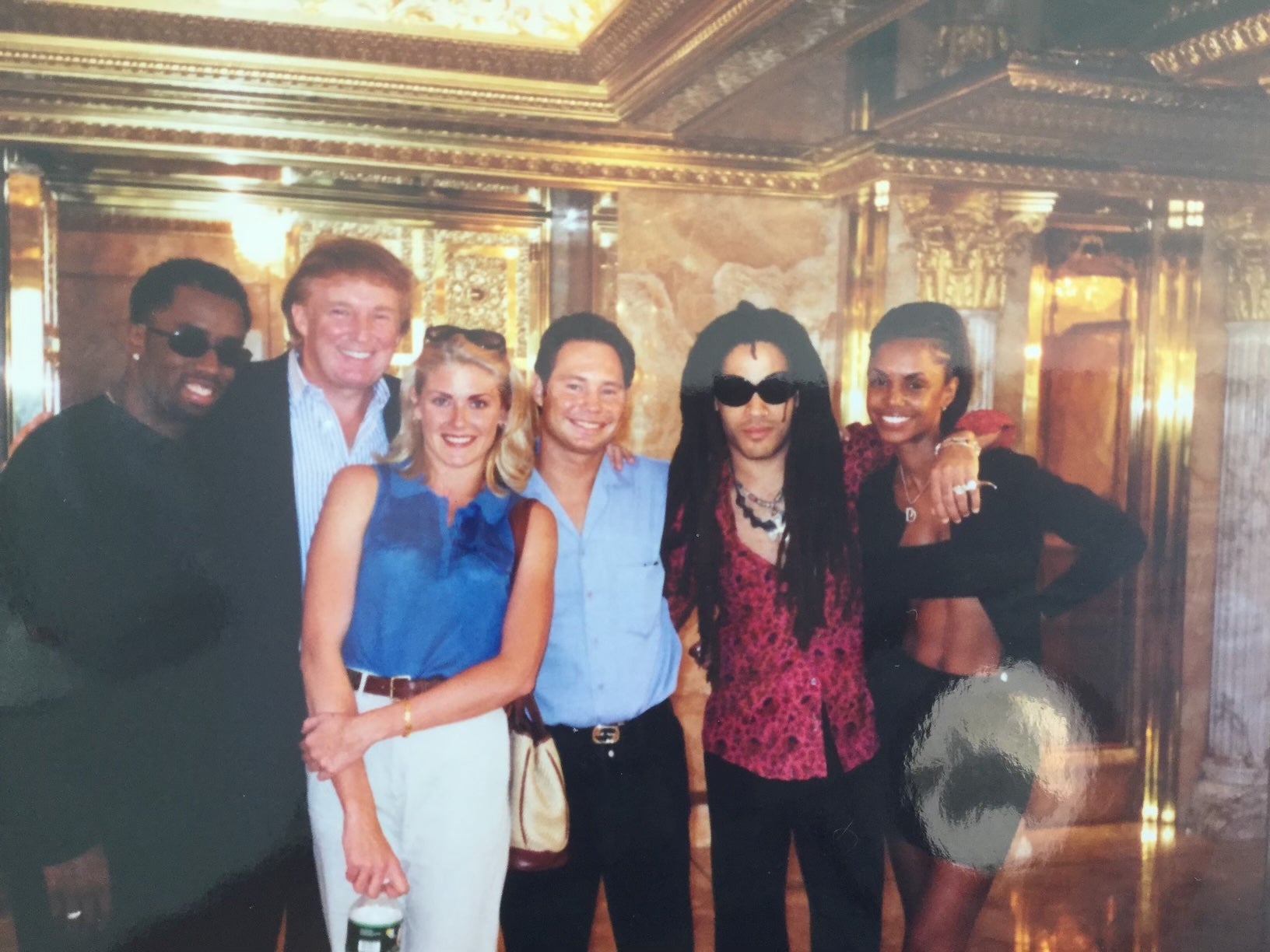 Amy Dorris with Donald Trump, Sean ‘Diddy’ Combs and Lenny Kravitz in Trump Tower in 1997. She is now speaking out about Trump’s reelection