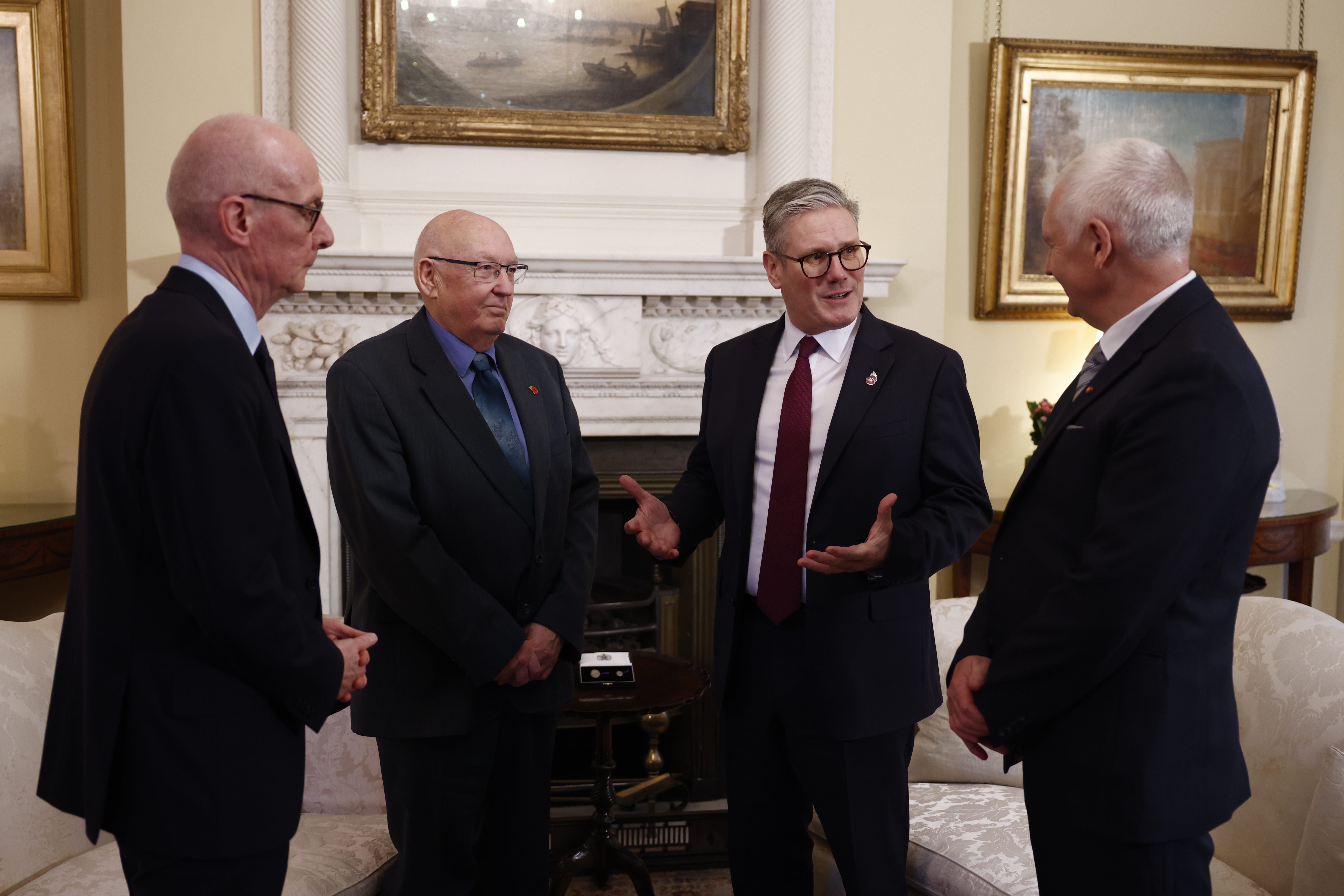 Prime Minister Sir Keir Starmer, centre right, and Chancellor of the Duchy of Lancaster Pat McFadden, left, with Elizabeth Emblem campaigners Bryn Hughes, right, and Paul Bone (Benjamin Cremel/PA)