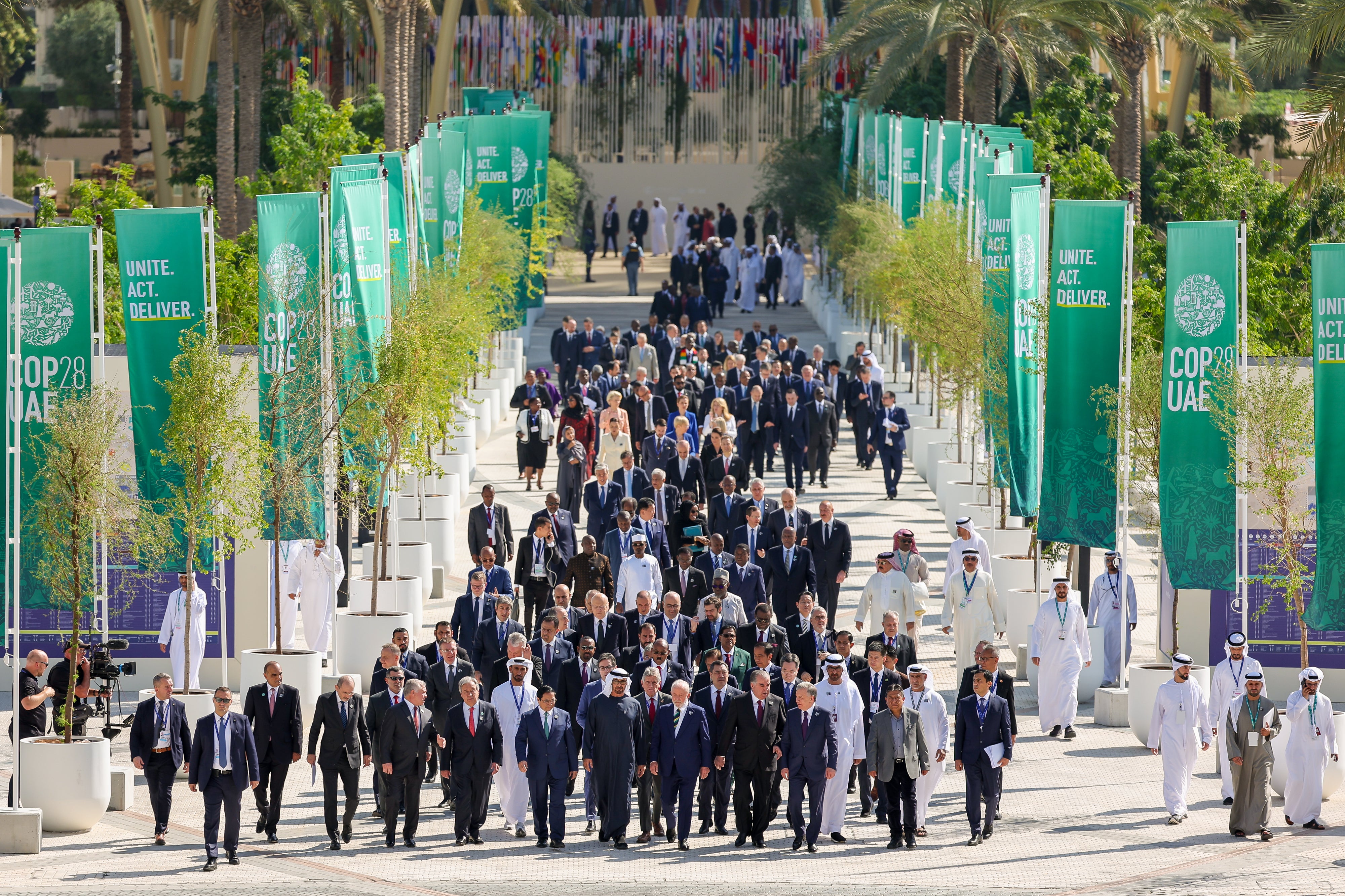 World leaders walk down Al Wasl avenue following a family photo during day one of the high-level segment of the UNFCCC COP28 Climate Conference at Expo City Dubai