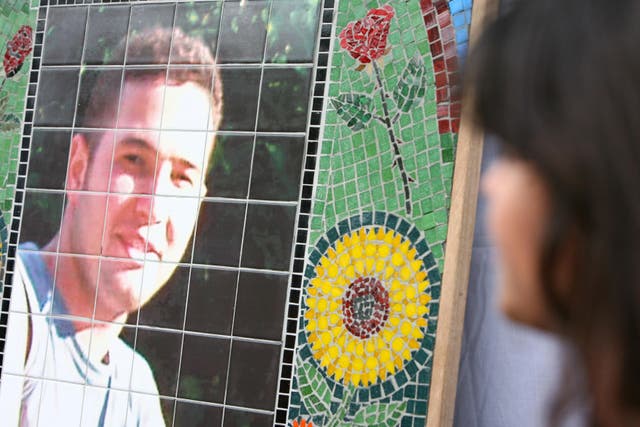 A mosaic of Jean Charles de Menezes outside Stockwell Tube station (PA)